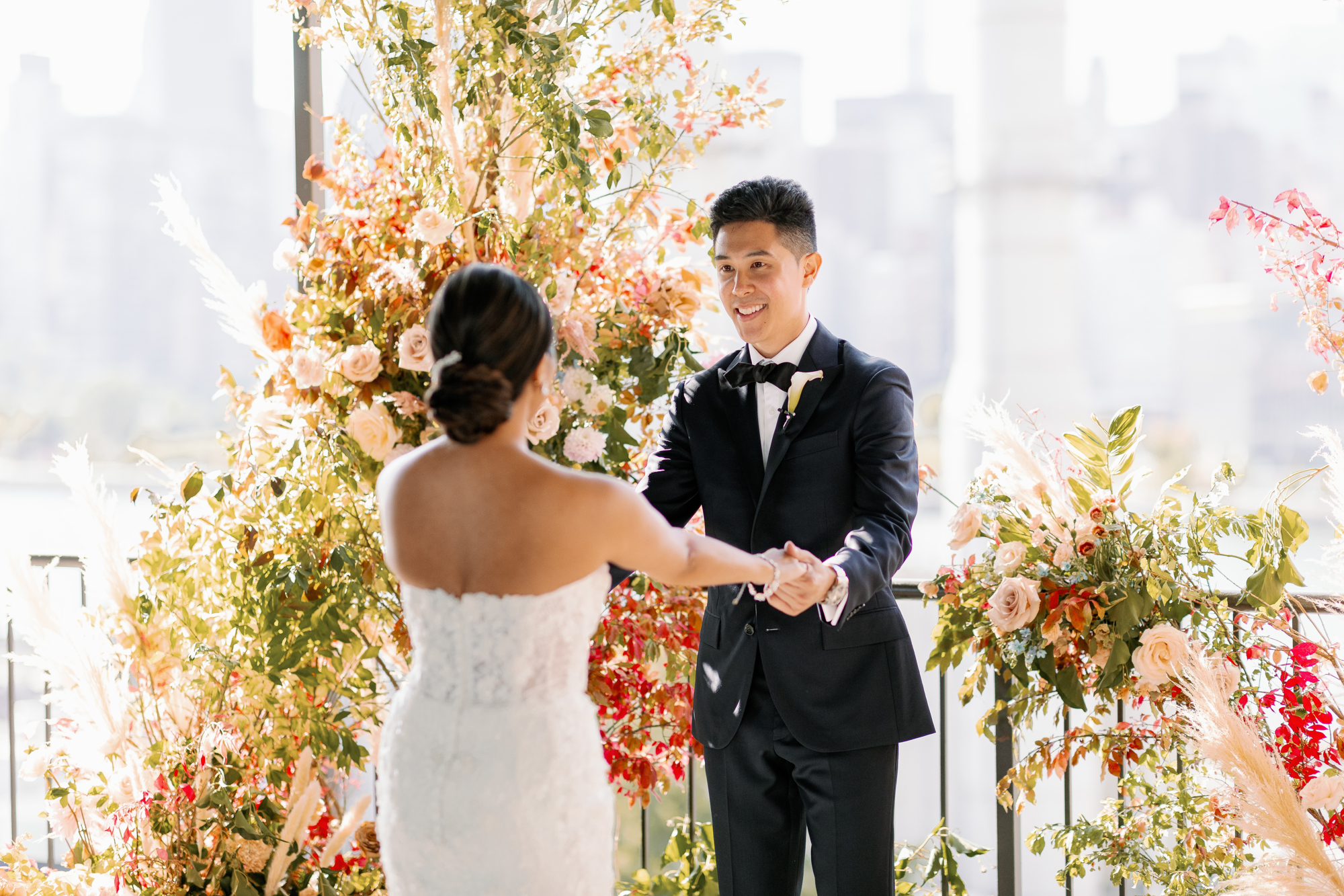 Ravel Hotel wedding in NYC with floral arch
