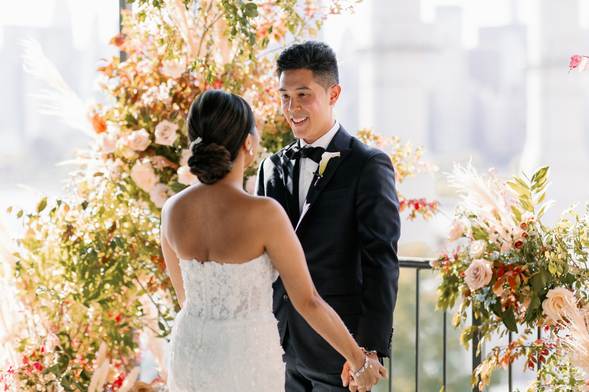 Ravel Hotel wedding in LIC with floral arch