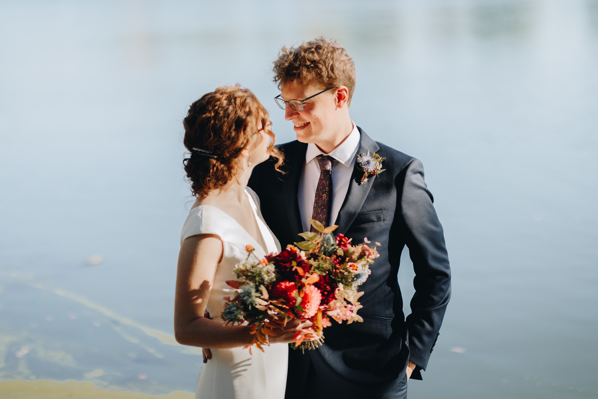 Prospect Park Pond wedding photo with fall bridal bouquet
