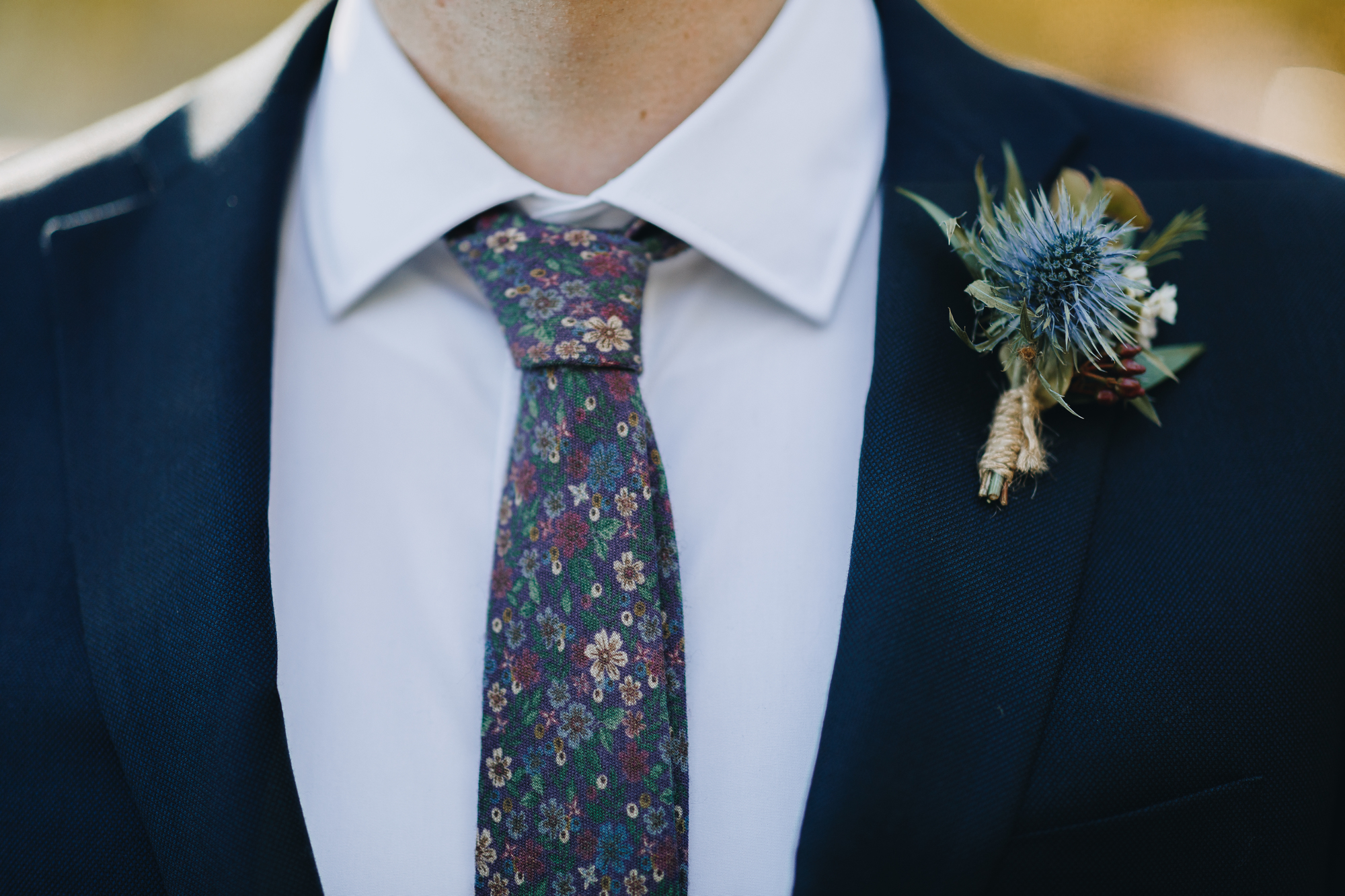 Fall wedding boutonniere and tie details in Brooklyn
