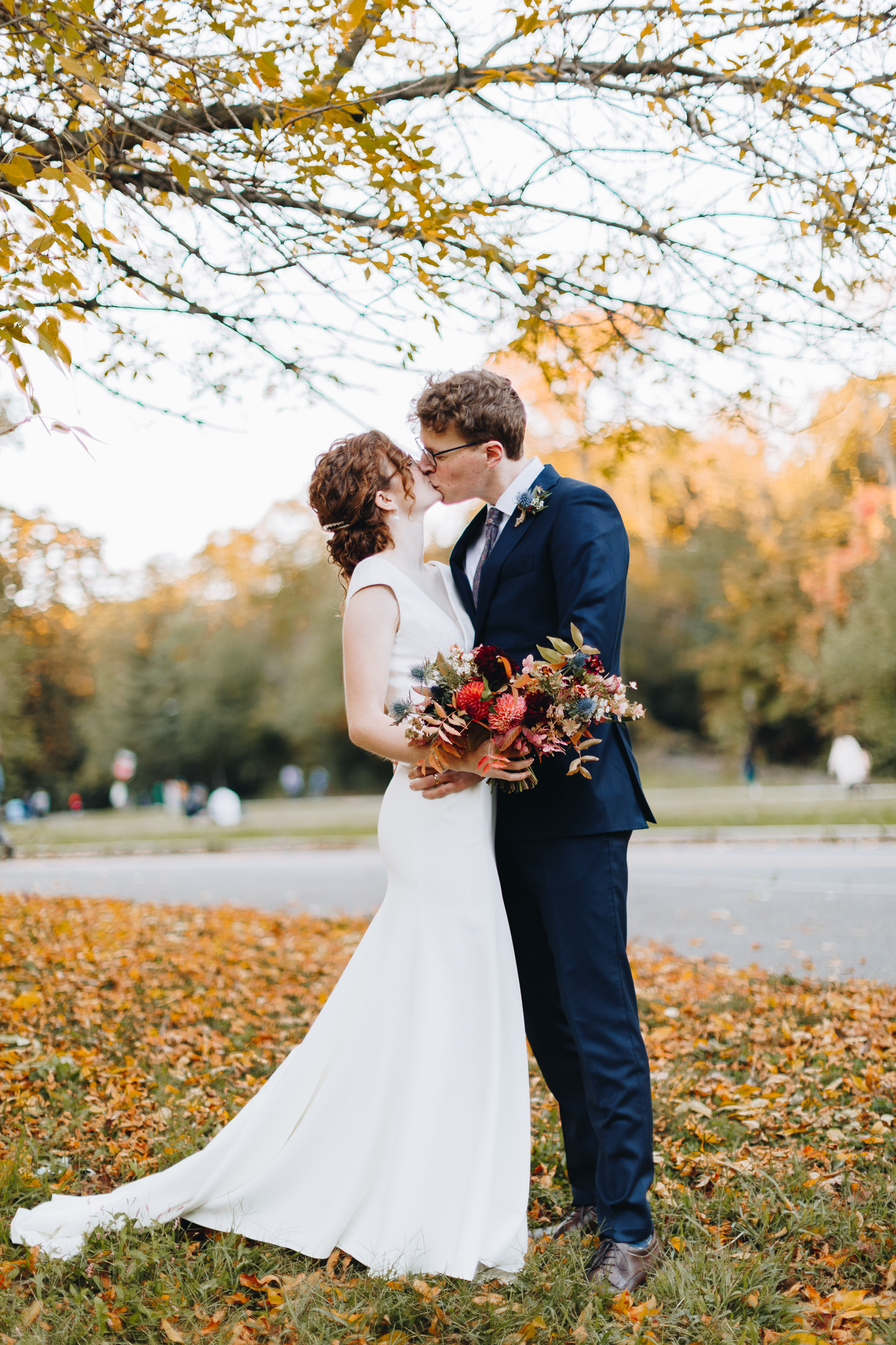 Fall wedding photos in Prospect Park with orange leaves