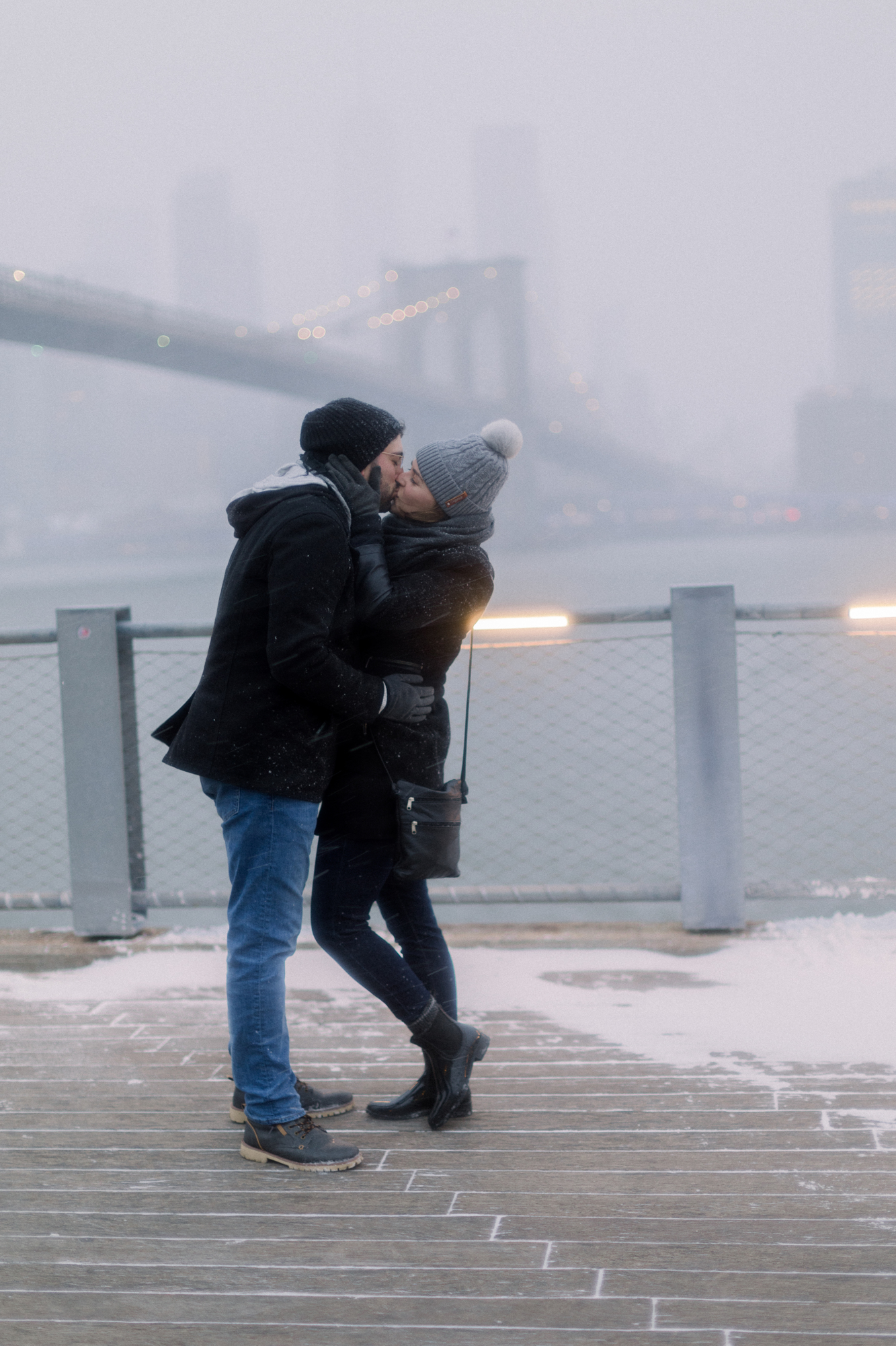 Brooklyn Bridge Park engagement photos in a snowstorm