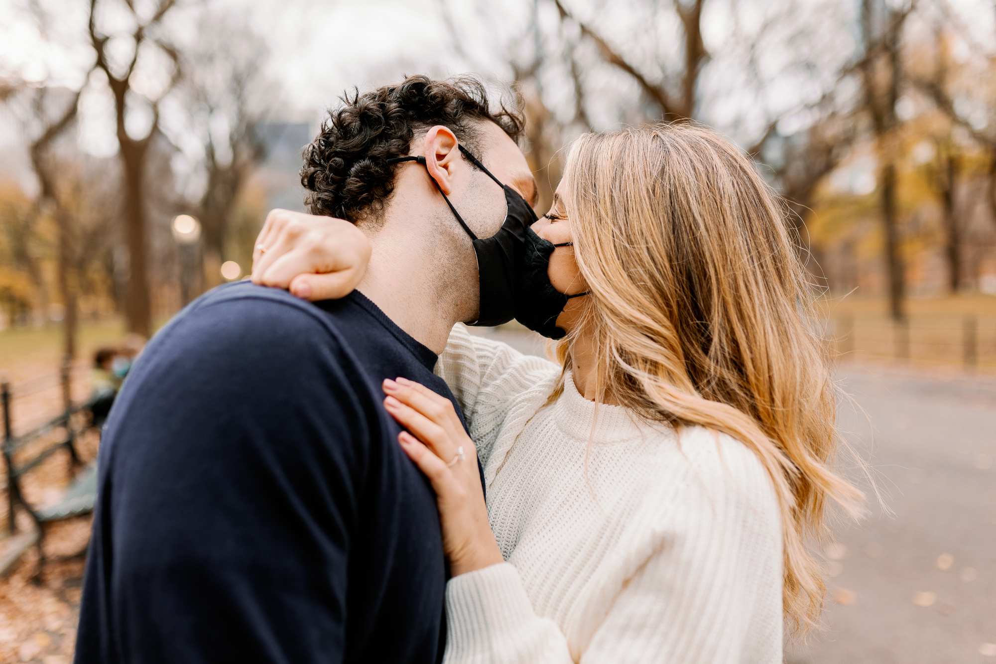 Engagement photos with masks in Central Park