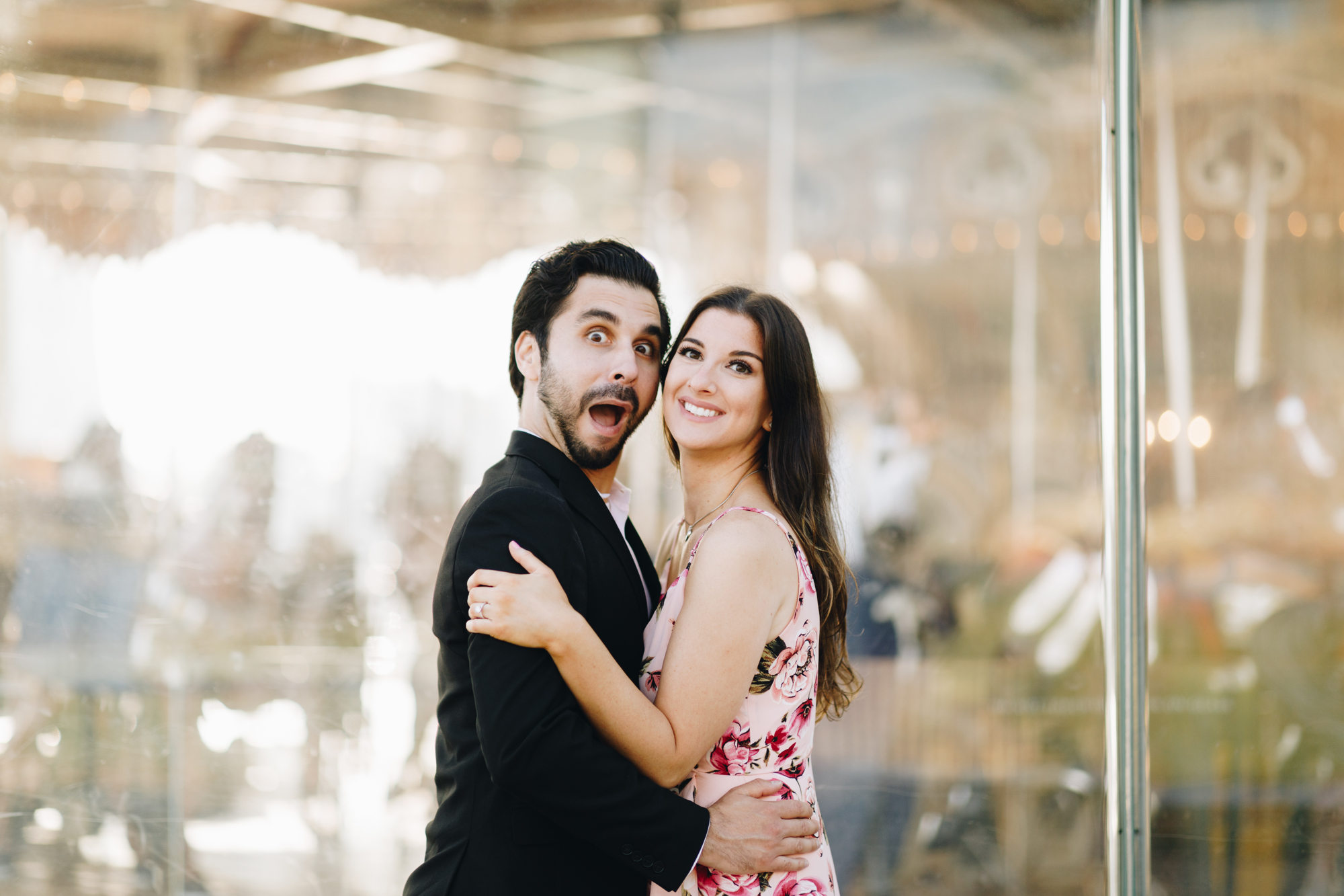 Funny Brooklyn engagement photos at Jane's Carousel