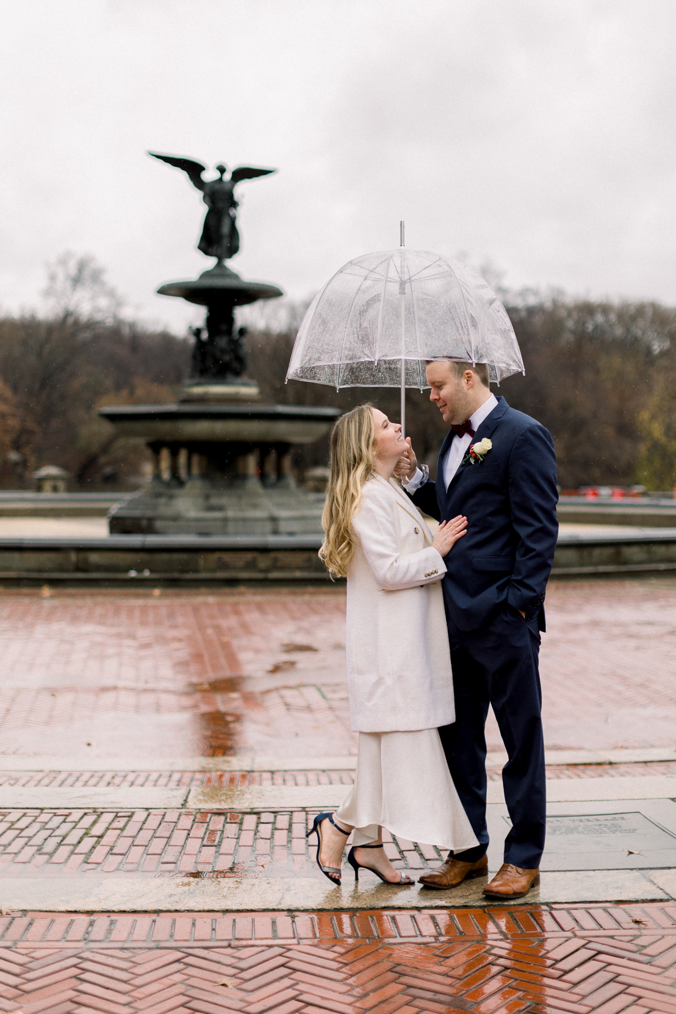 Rainy wedding photos at Bethesda Terrace in New York