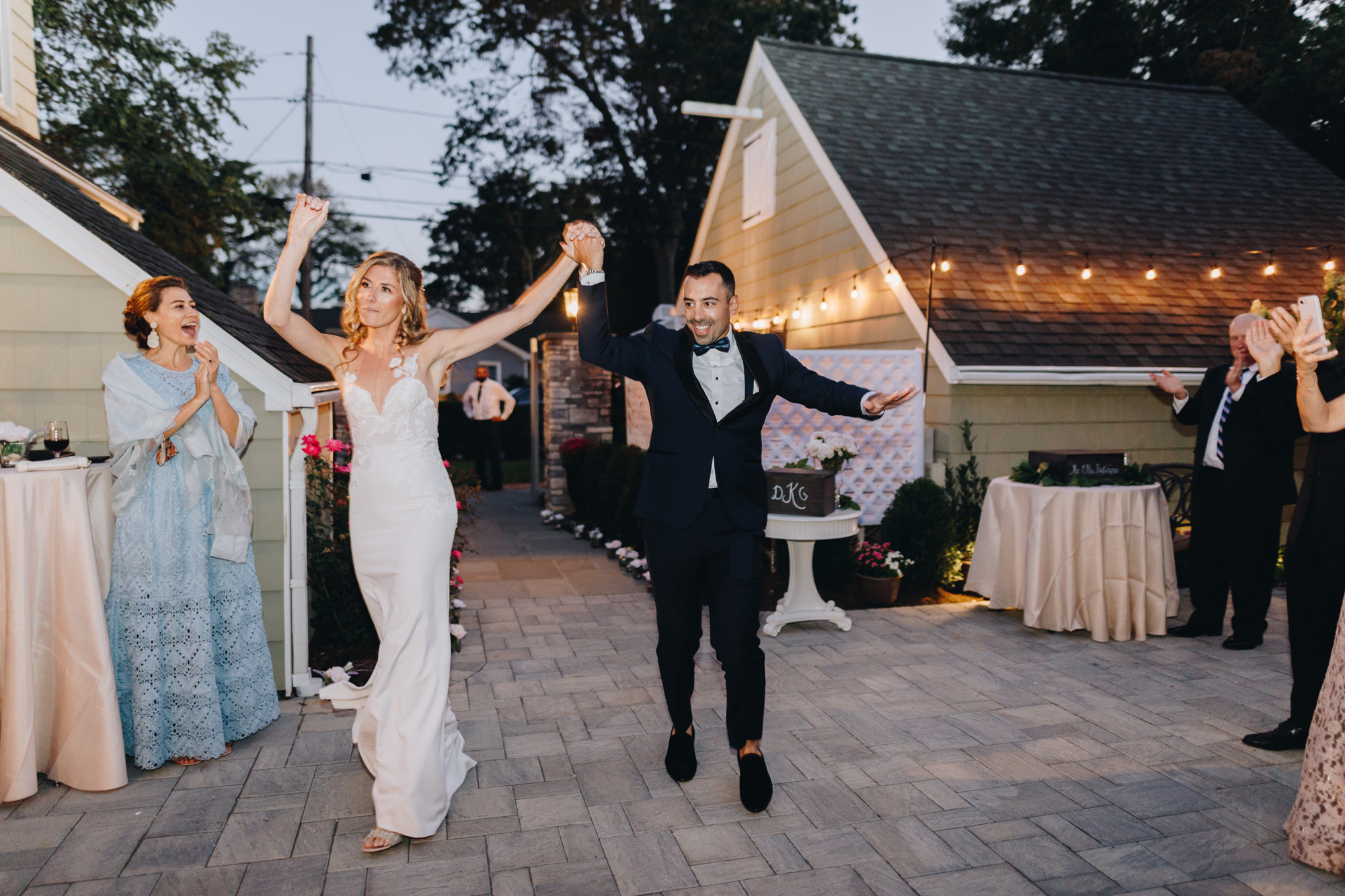 Backyard wedding reception on Long Island with fairy lights