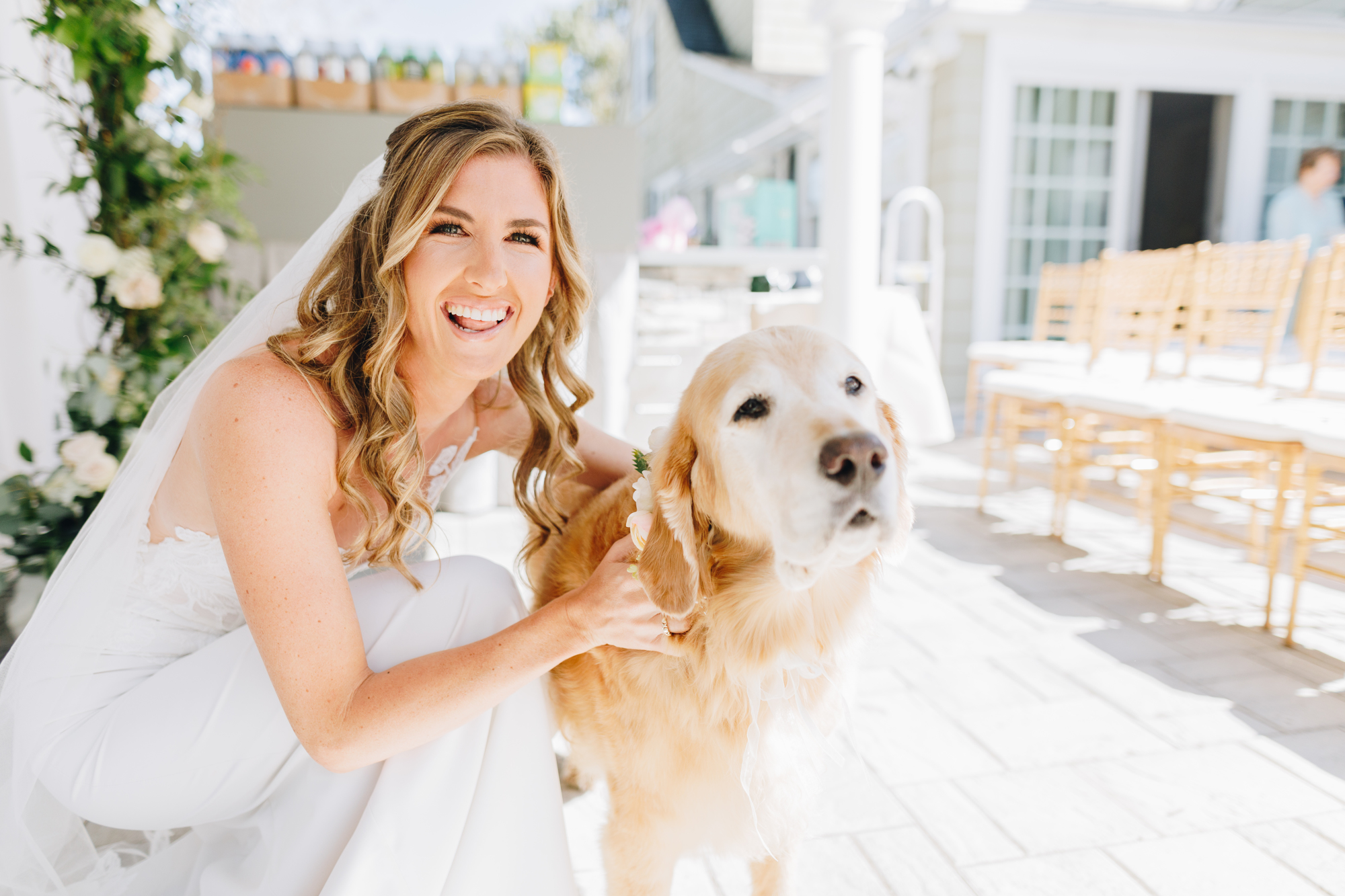 Bride with dog at backyard wedding on Long Island