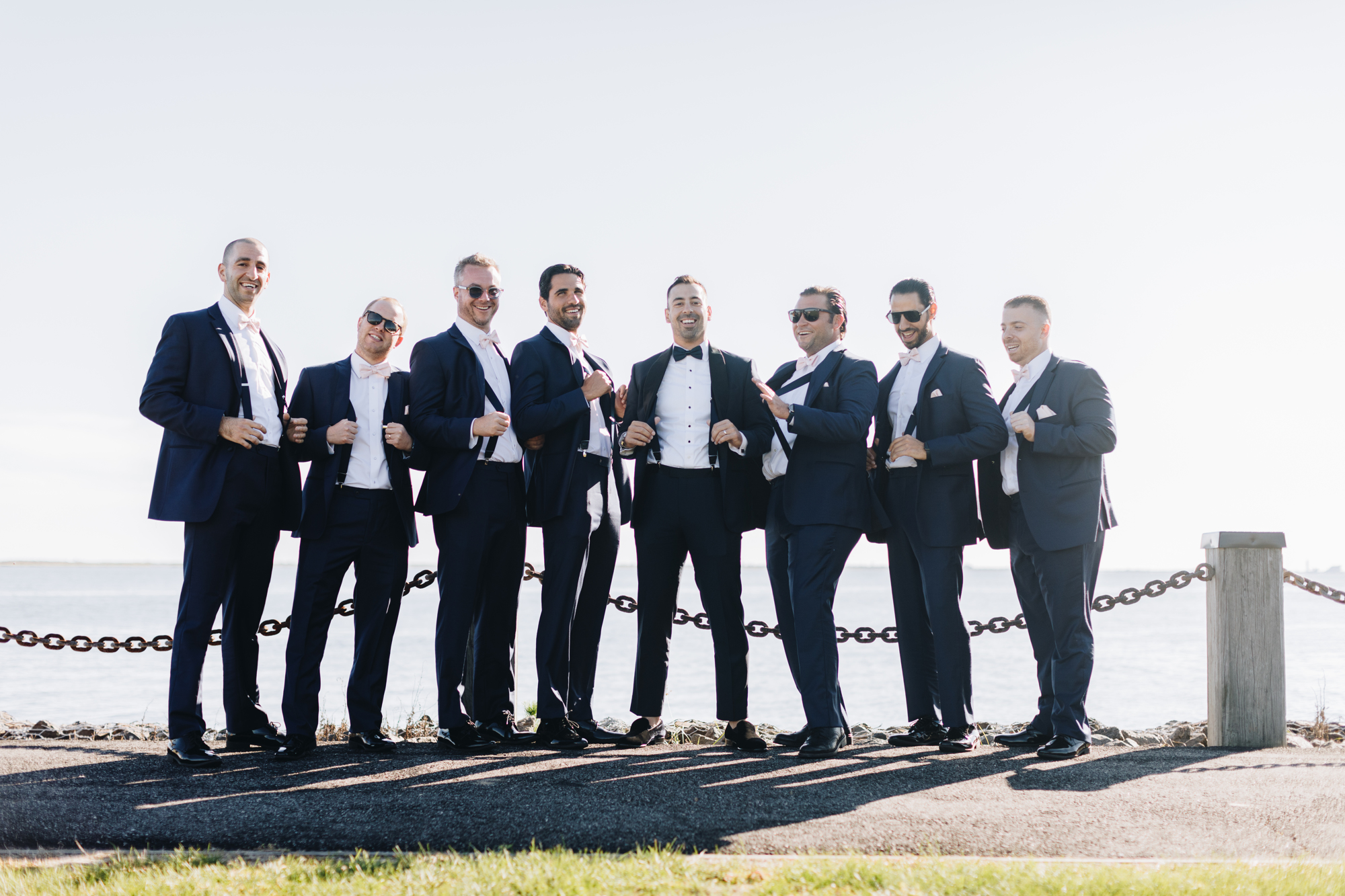 Funny groomsmen candid photos on Long Island
