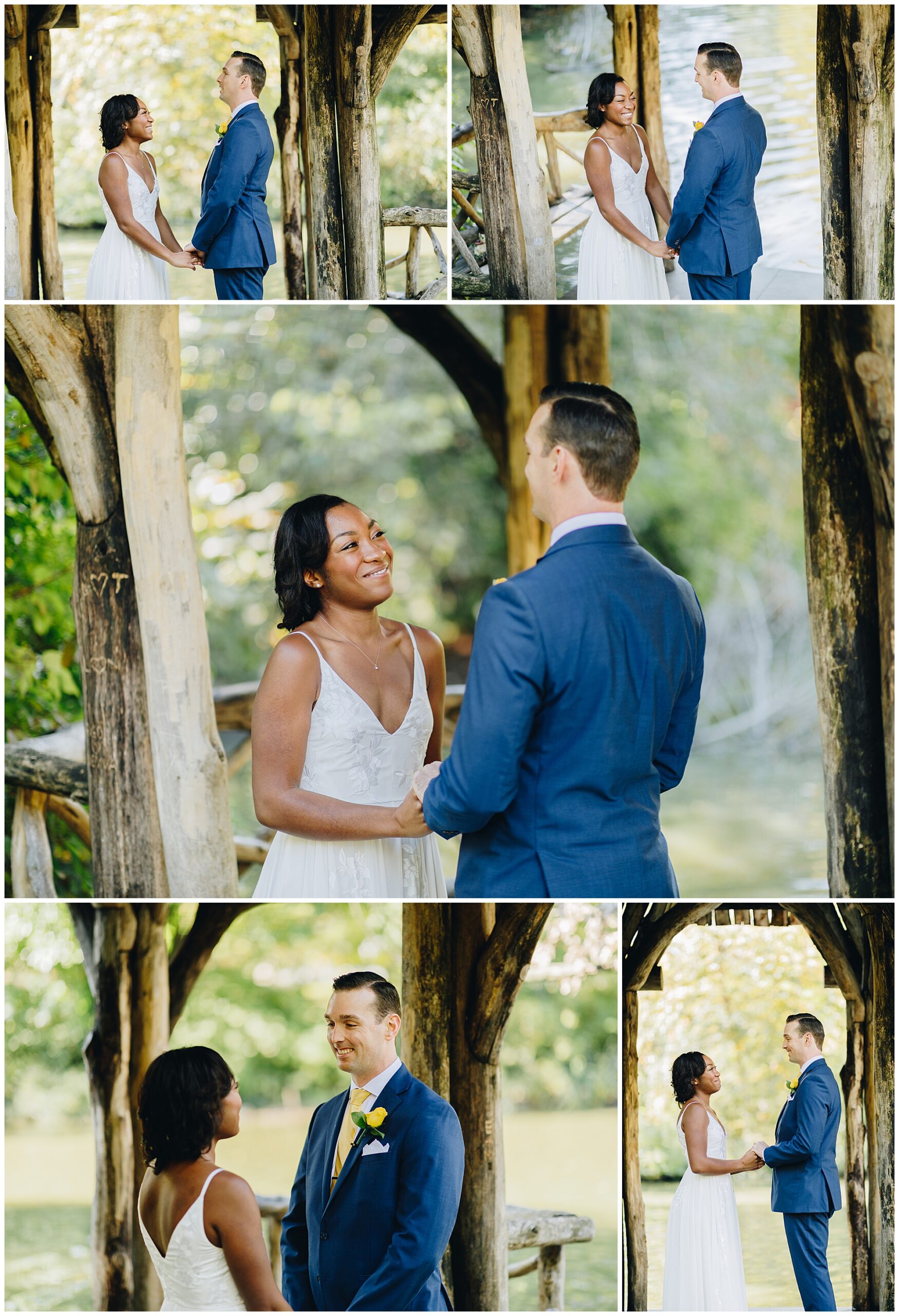 A couple in wedding attire stands under a rustic wooden gazebo by the water, holding hands and exchanging loving gazes and smiles during their intimate Wagner Cove elopement.