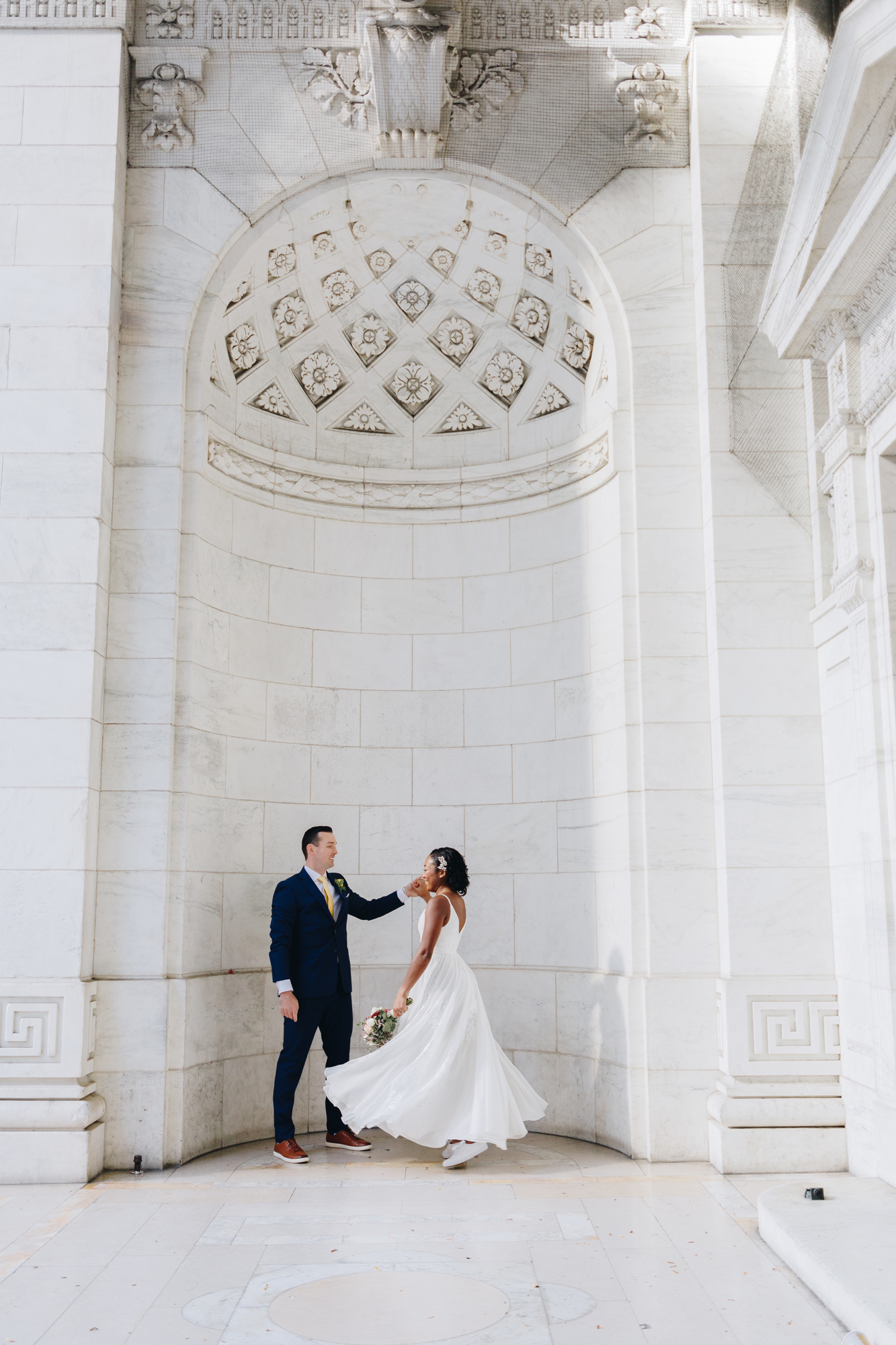 NYPL elopement photos with iconic NYC architecture