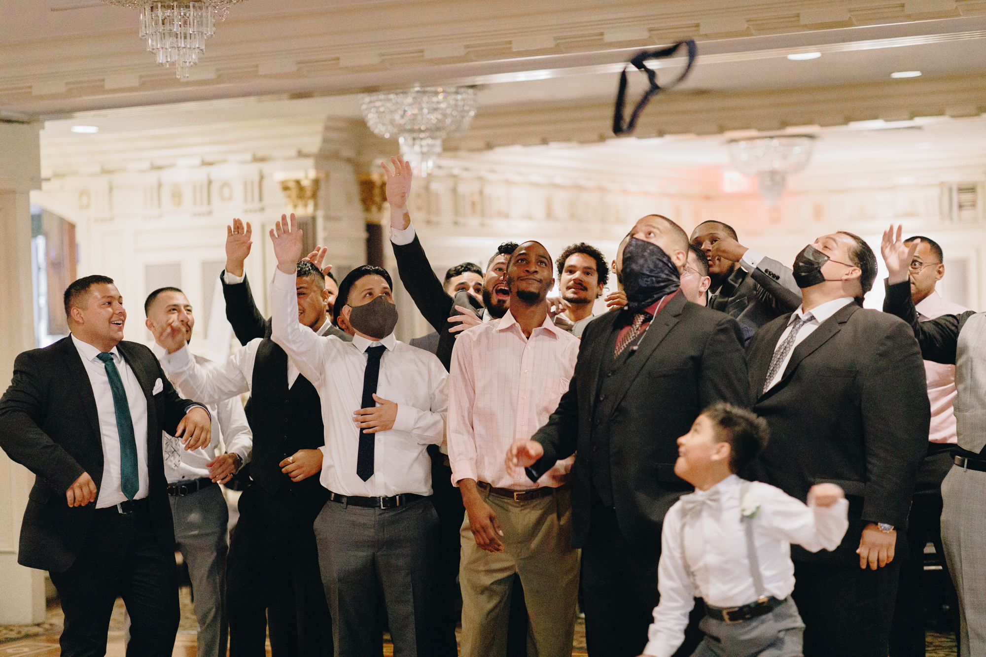 Groom tie toss at a wedding in New Jersey
