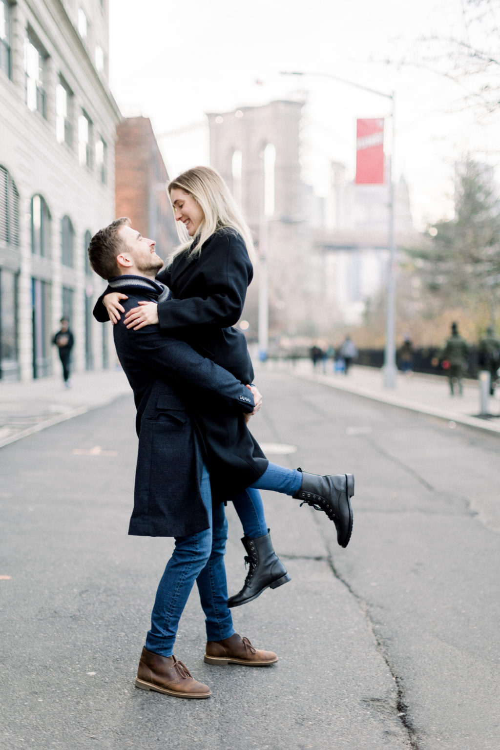 Dumbo Proposal in Winter with NYC Skyline and Brooklyn Bridge Views