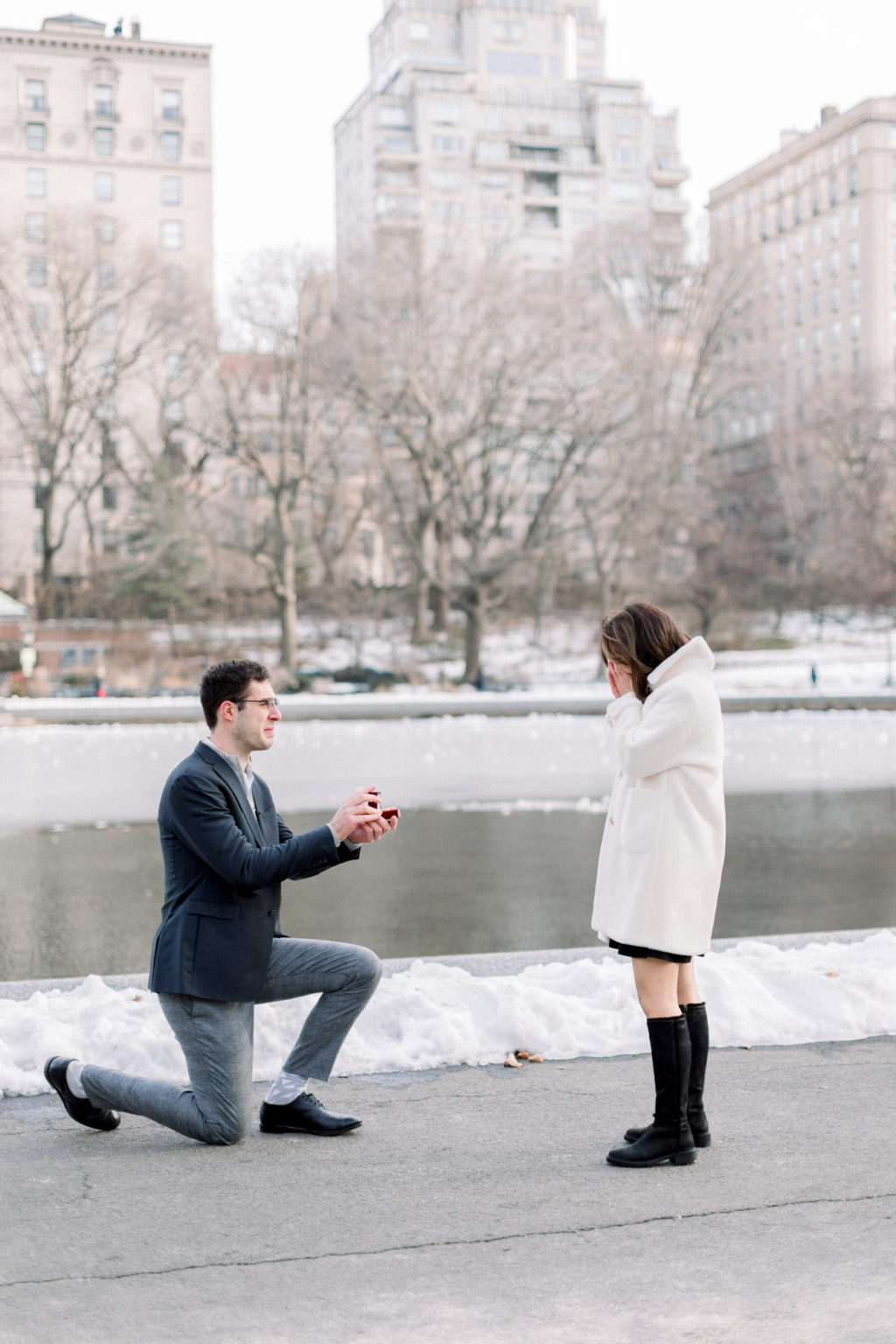 Winter Central Park Proposal Photography by Toy Boat Pond in NYC