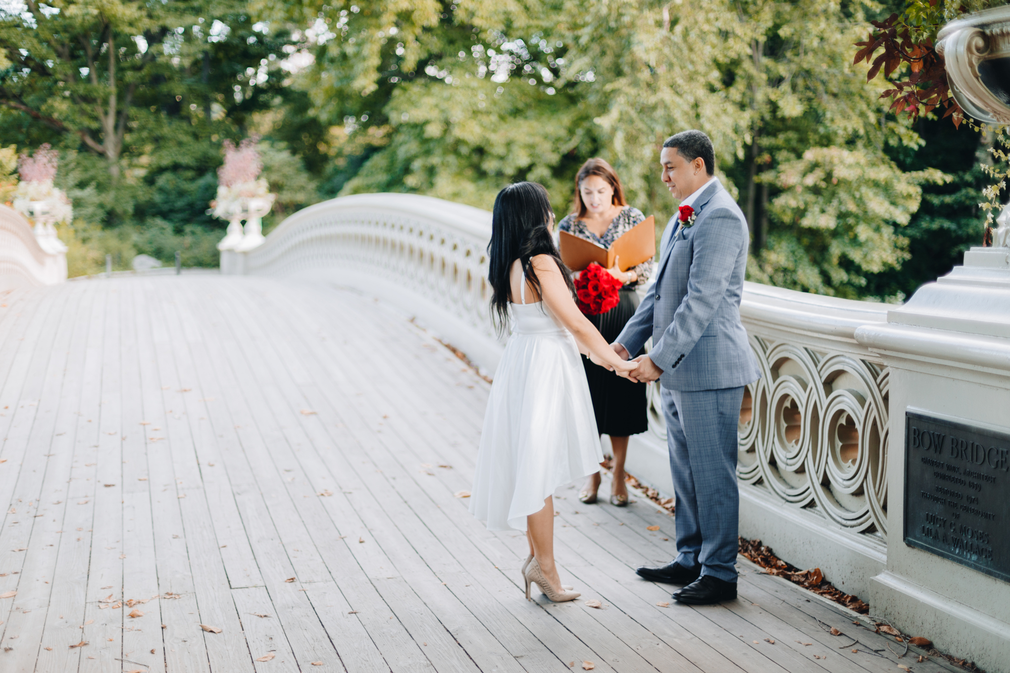 Fun and Candid Bow Bridge Elopement Photos in Fall Foliage