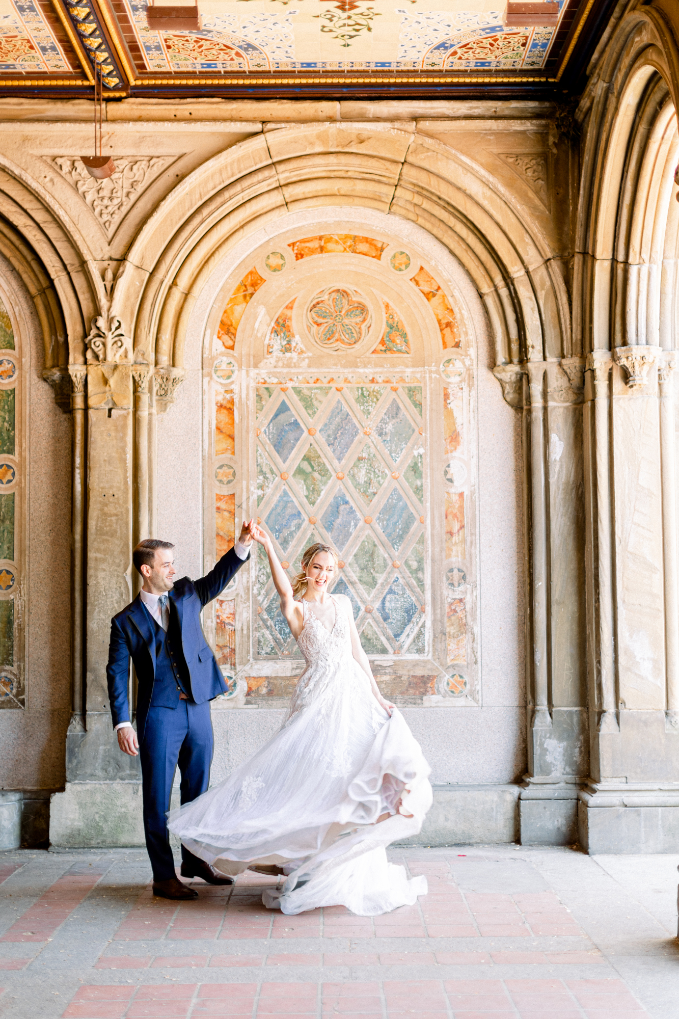 Candid Elopement Photos in Central Park's Spring Wisteria Pergola