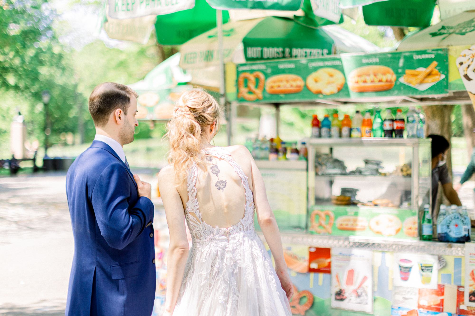 Whimsical Elopement Photos in Central Park's Spring Wisteria Pergola