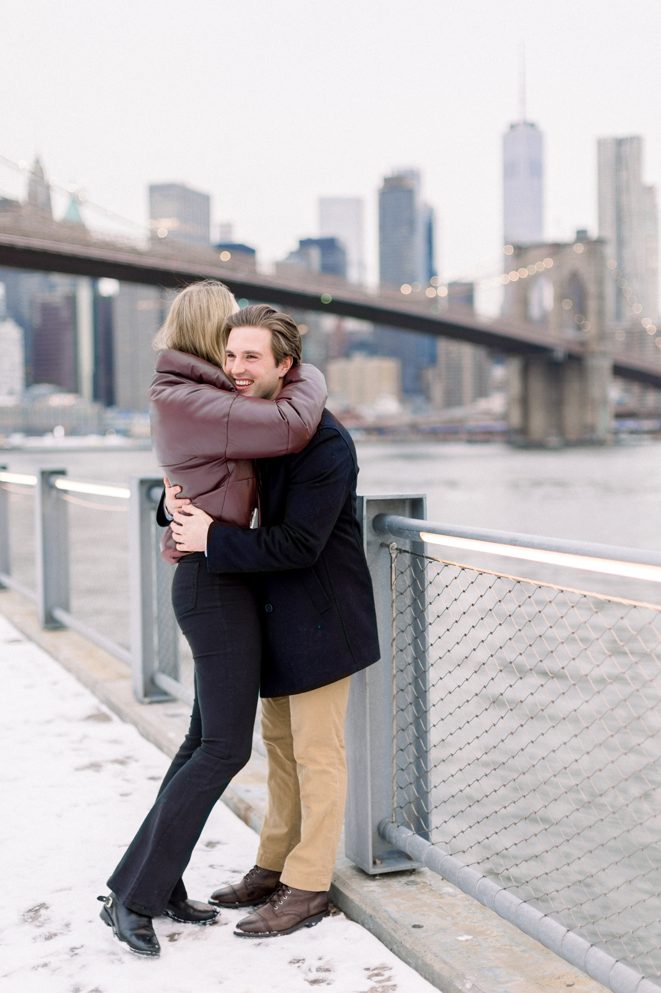 Joyful Surprise Proposal Photos in DUMBO Featuring Brooklyn Bridge Park