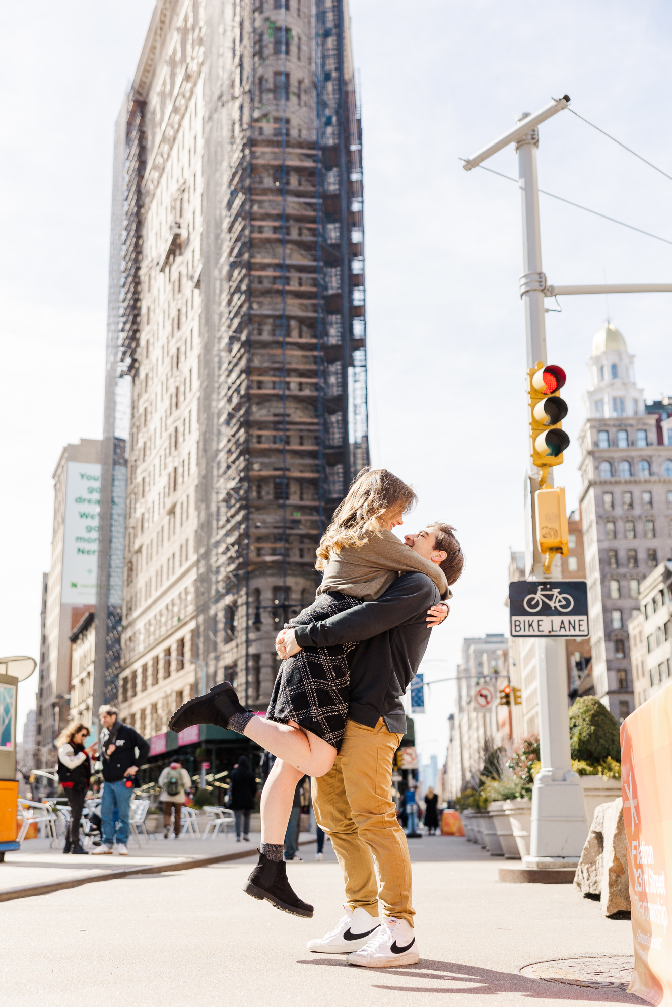 Sweet and Playful Engagement Photos in Wintery Madison Square Park