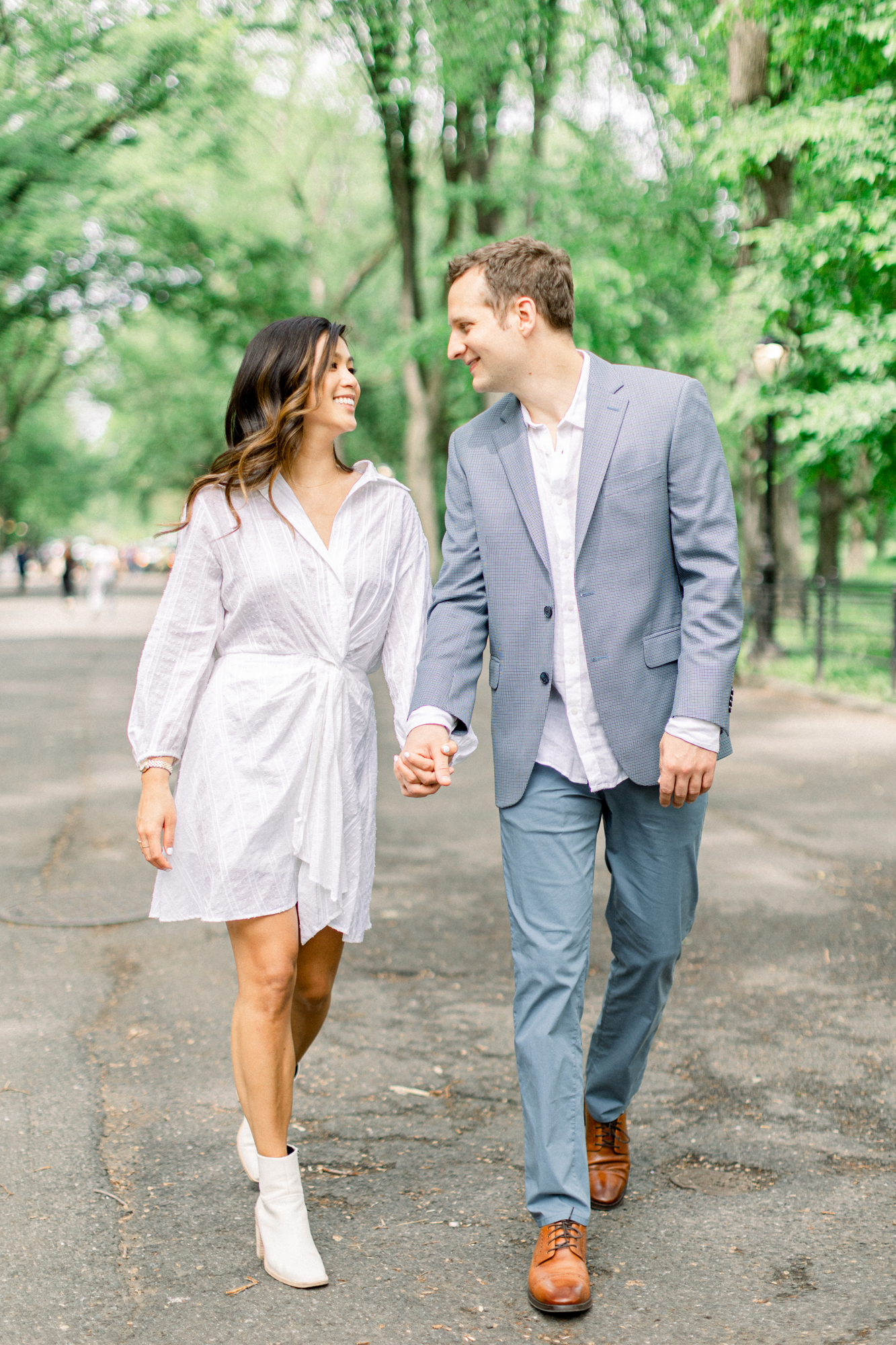 Fashionable Central Park Rowboat Engagement Photography in New York