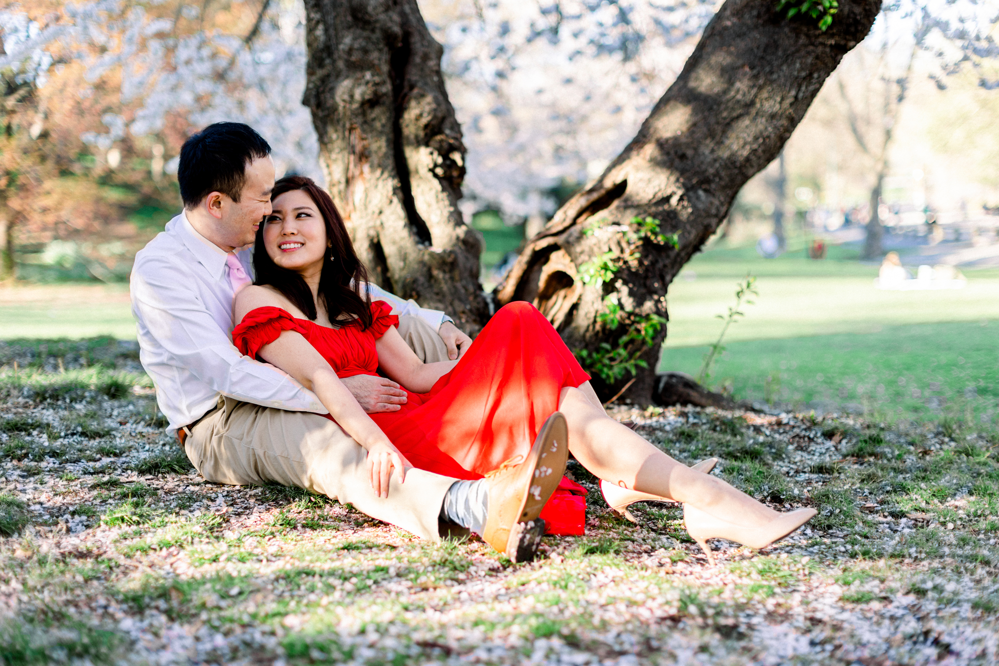 Idyllic NYC Engagement Photography with Spring Blossoms