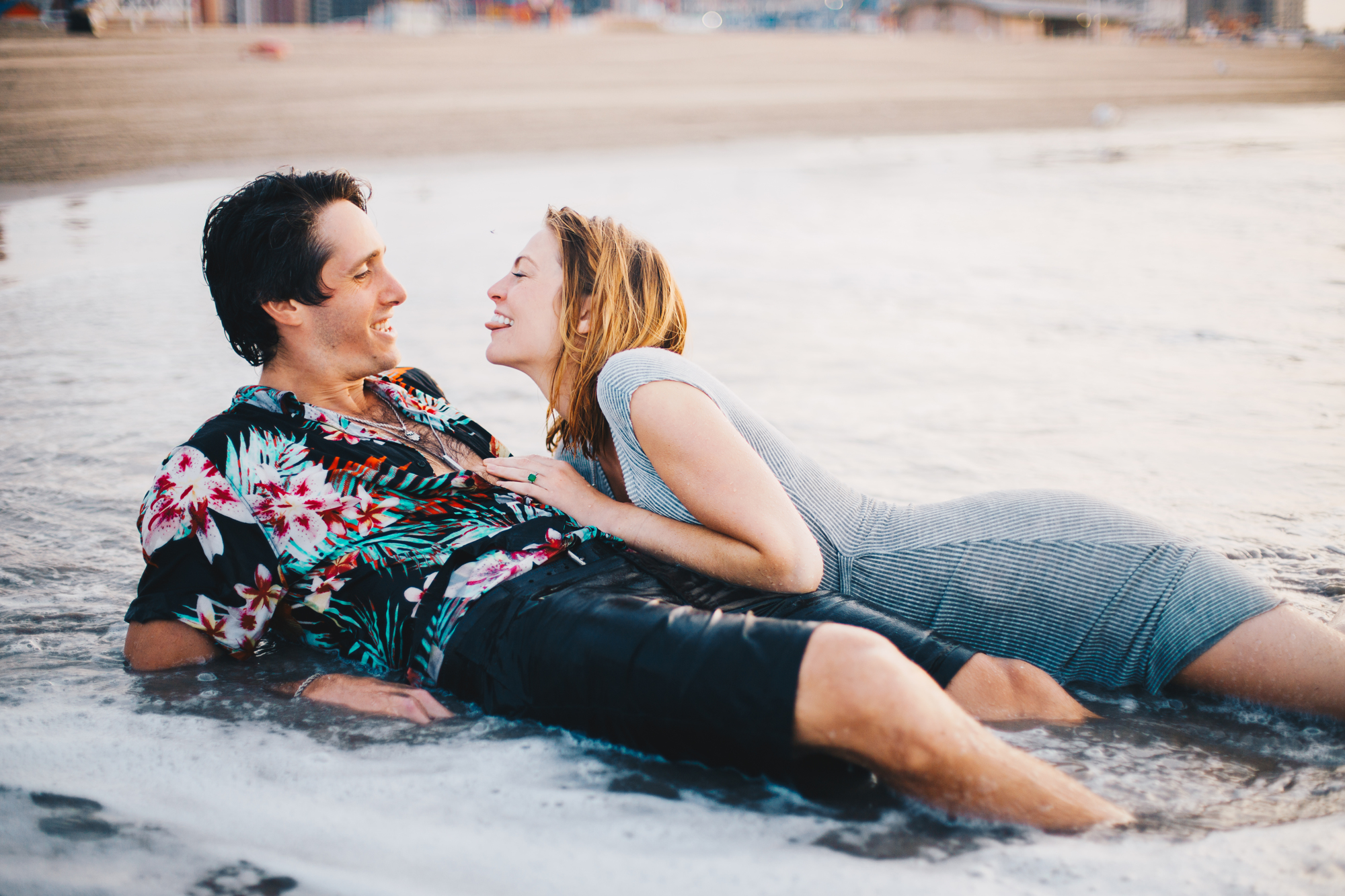 Funny Sunrise Engagement Photos on the Beach at Coney Island