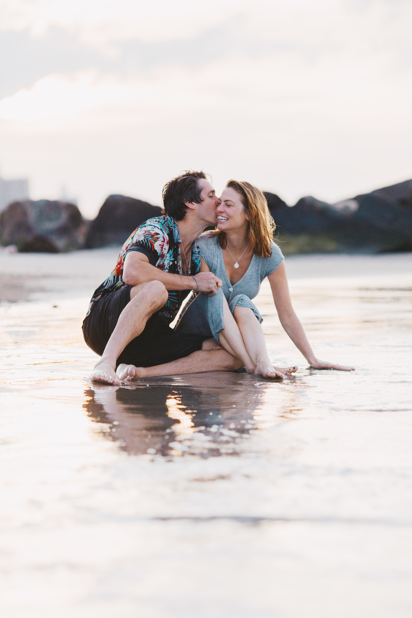 Candid Sunrise Engagement Photos on the Beach at Coney Island
