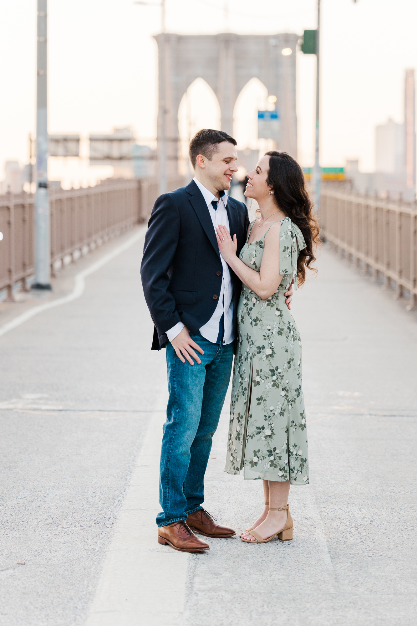 Touching Brooklyn Bridge and South Street Seaport Engagement Photography