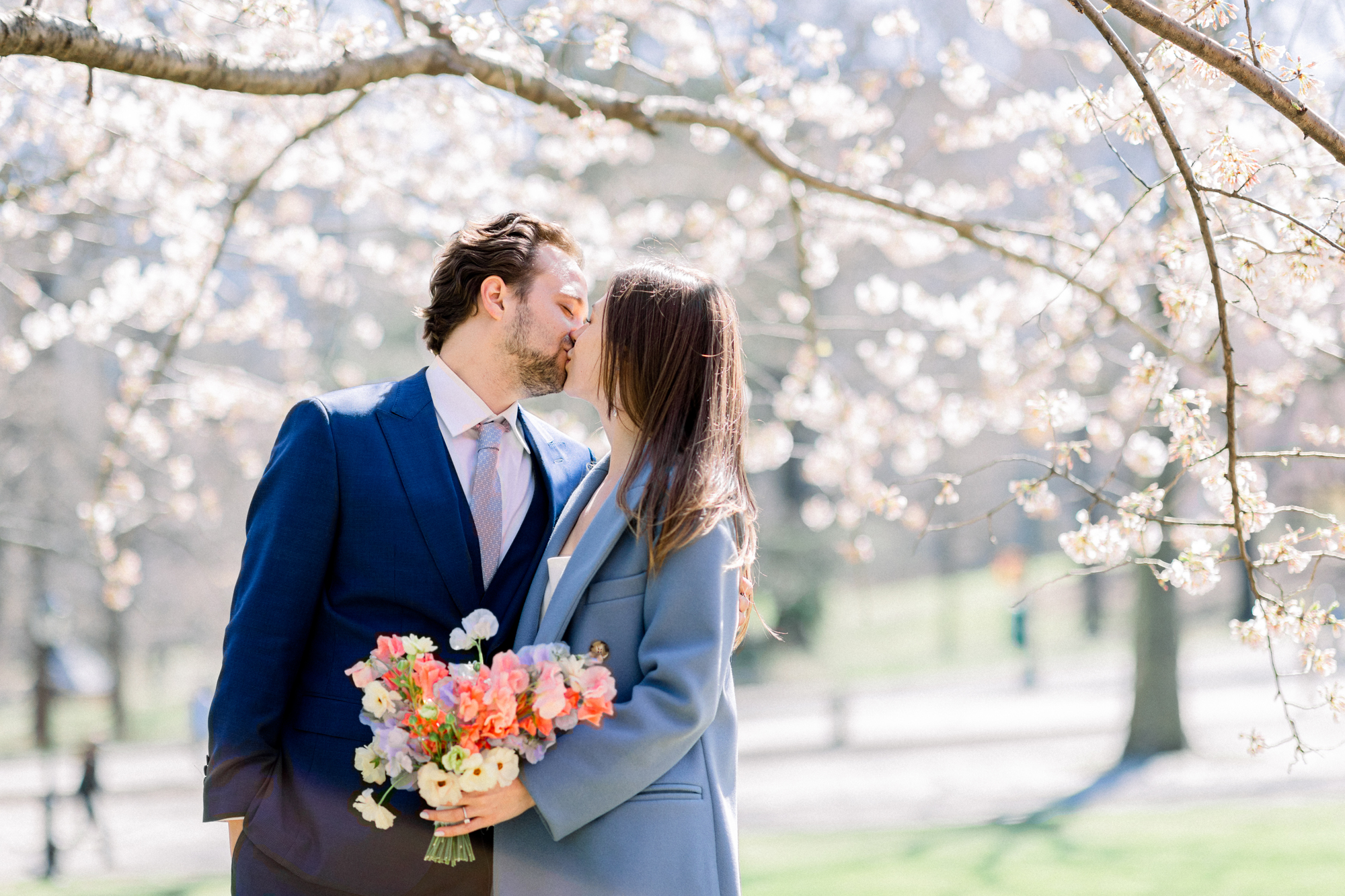 Inspiring Bow Bridge Wedding Photos Among Central Park's Spring Cherry Blossoms