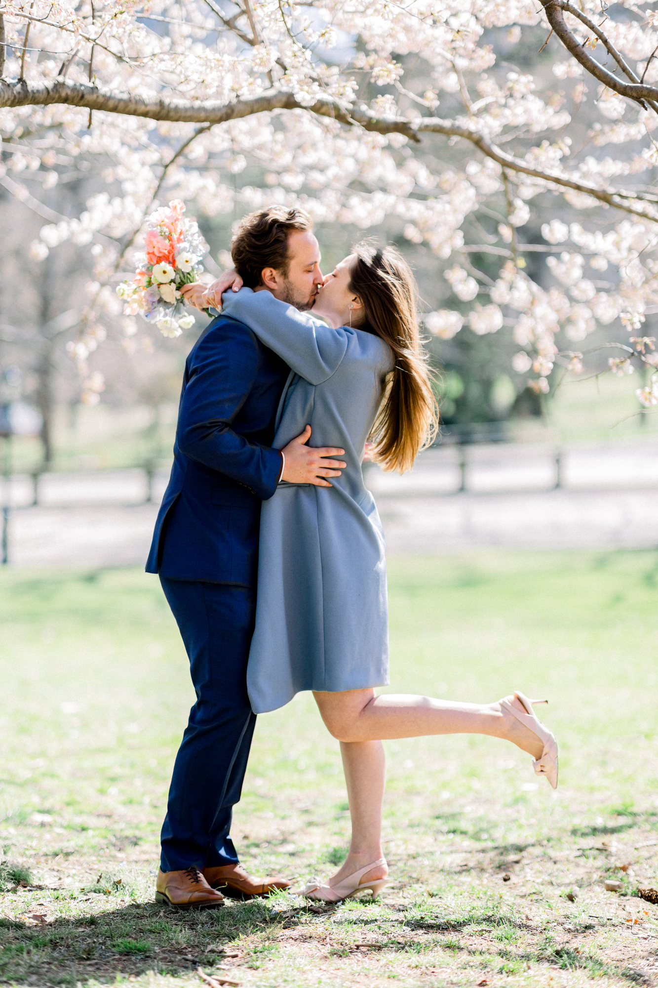 Romantic Bow Bridge Wedding Photos Among Central Park's Spring Cherry Blossoms