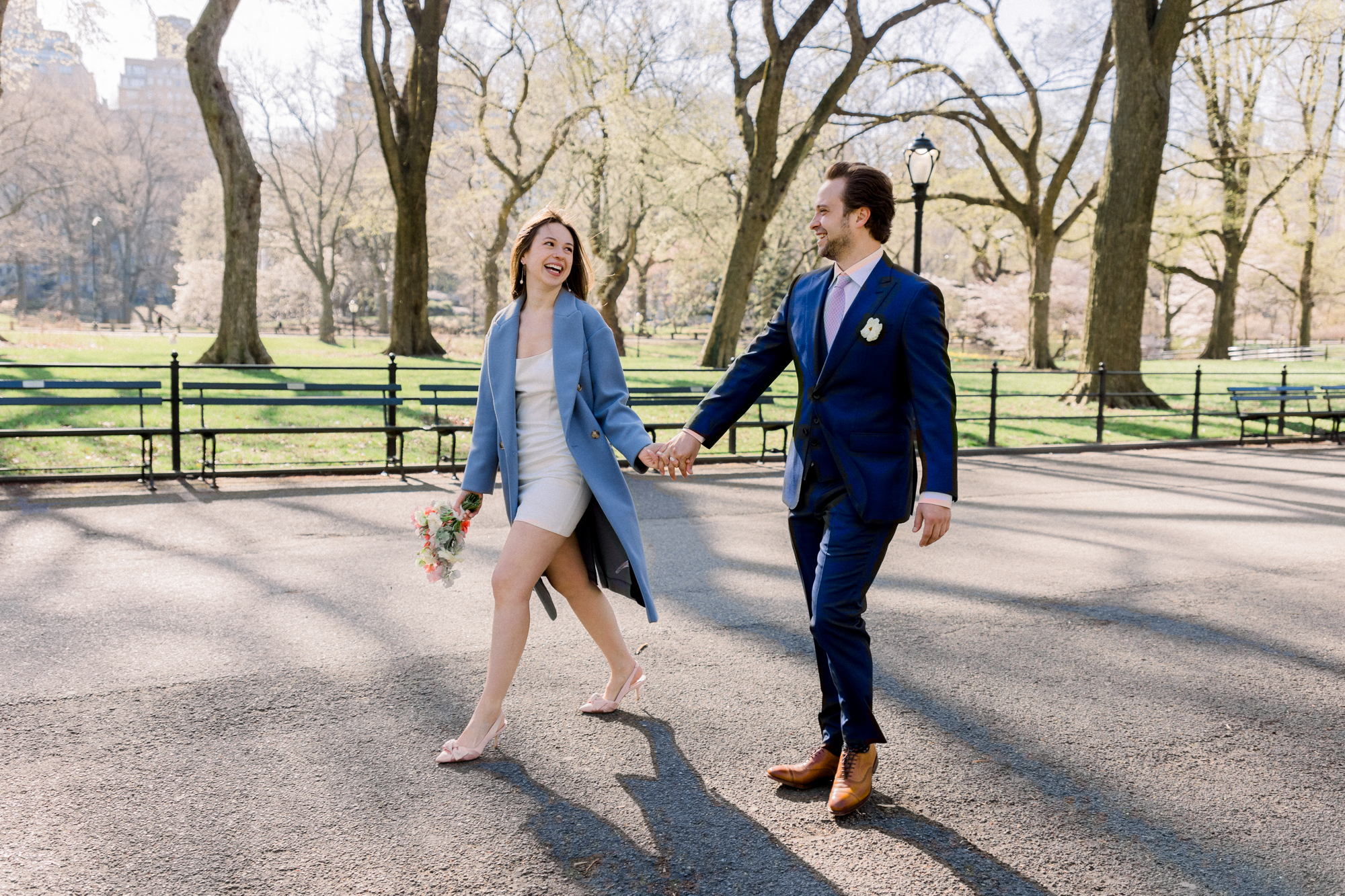 Timeless Bow Bridge Wedding Photos Among Central Park's Spring Cherry Blossoms