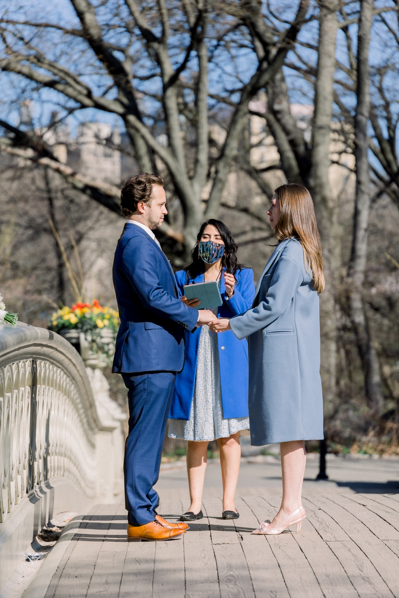 Charming Bow Bridge Wedding Photos Among Central Park's Spring Cherry Blossoms
