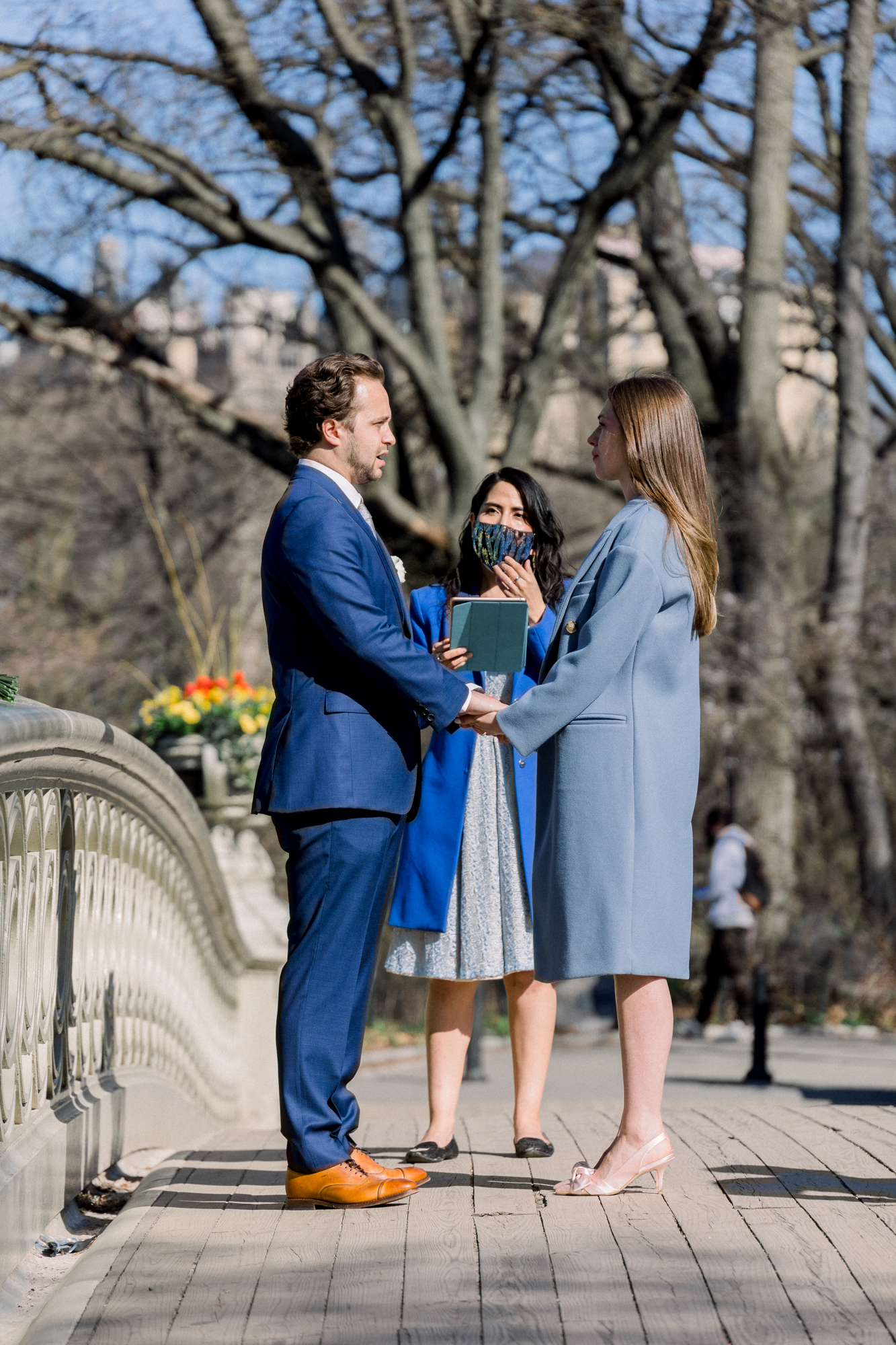 Stunning Bow Bridge Wedding Photos Among Central Park's Spring Cherry Blossoms