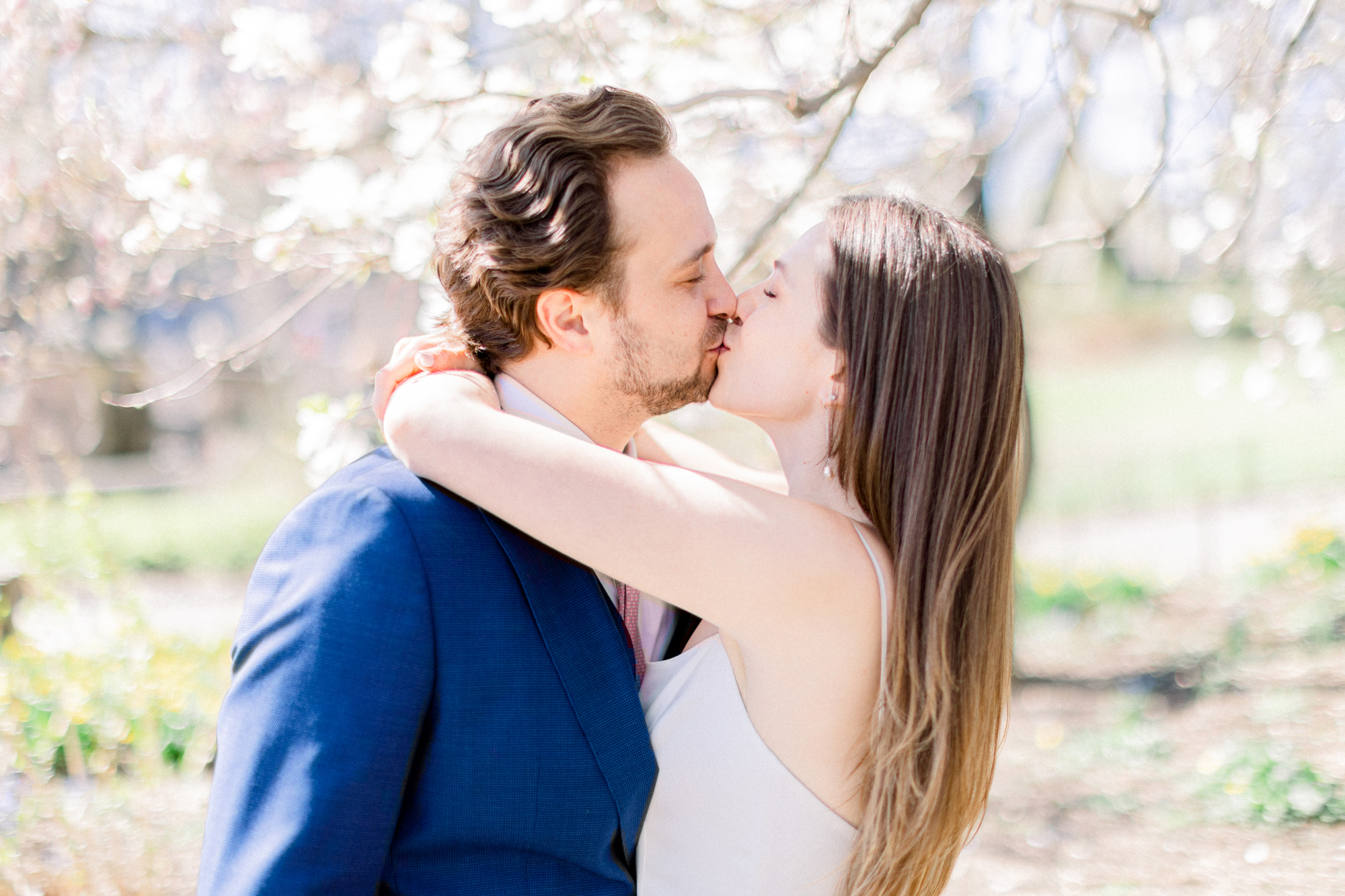Romantic Spring Bow Bridge Wedding in Central Park Among the Cherry Blossoms