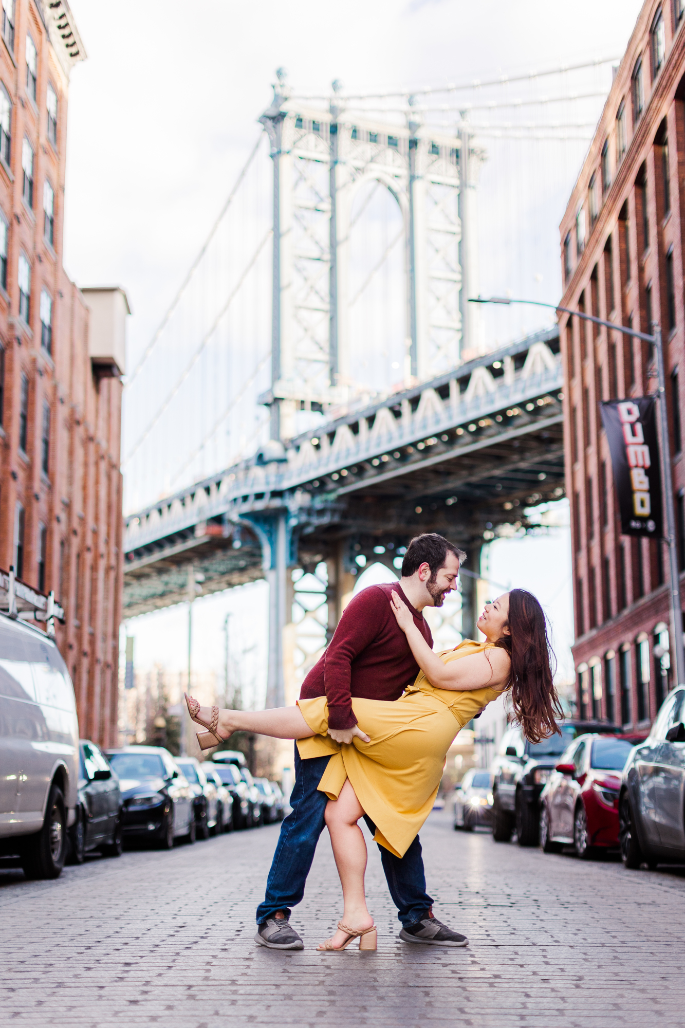 Striking Brooklyn Bridge Engagement Photography with Matching Outfits