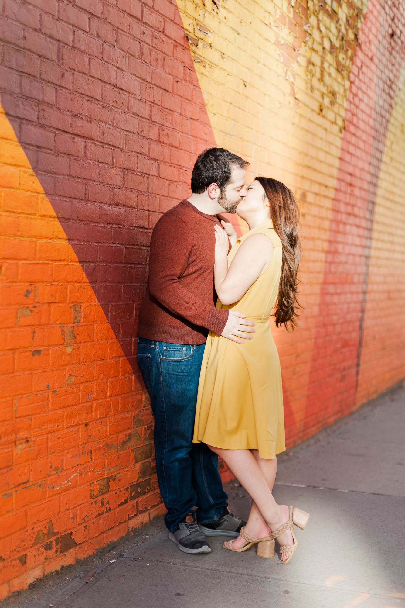 Vibrant Brooklyn Bridge Engagement Photography with Matching Outfits