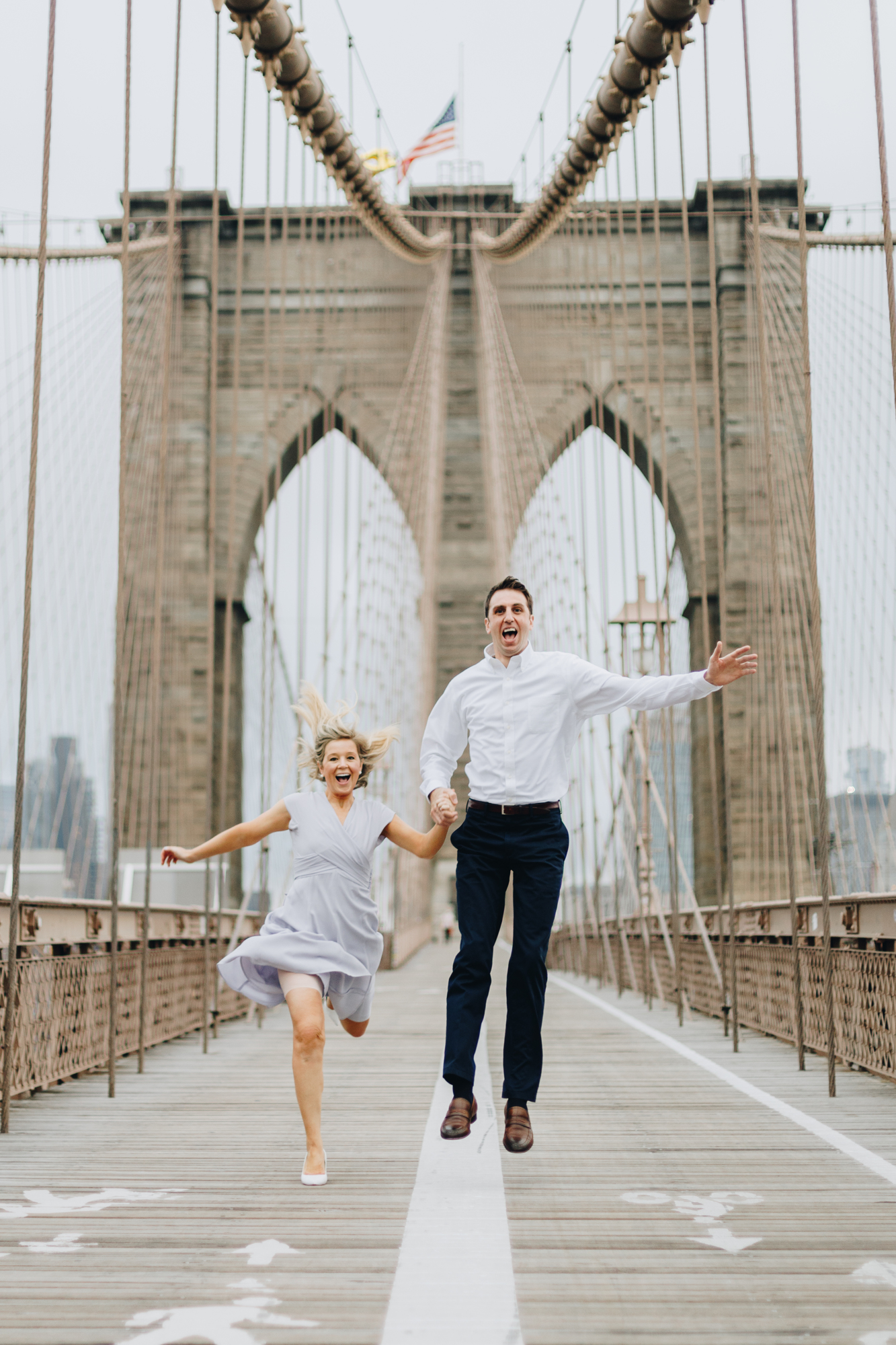 Funny Brooklyn Bridge Park Engagement Photos on a Cloudy Day in New York