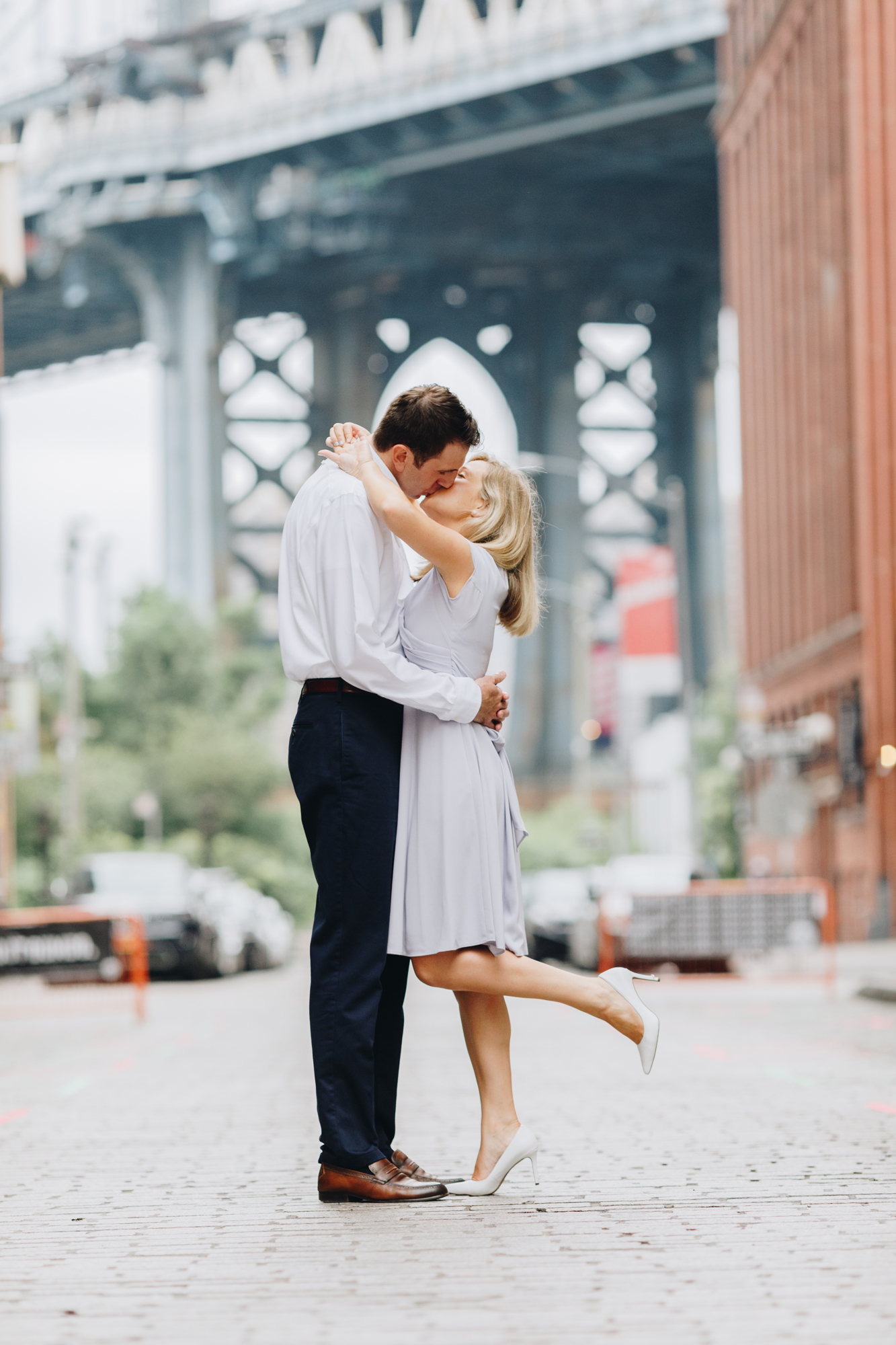 Touching Brooklyn Bridge Park Engagement Photos on a Cloudy Day in New York