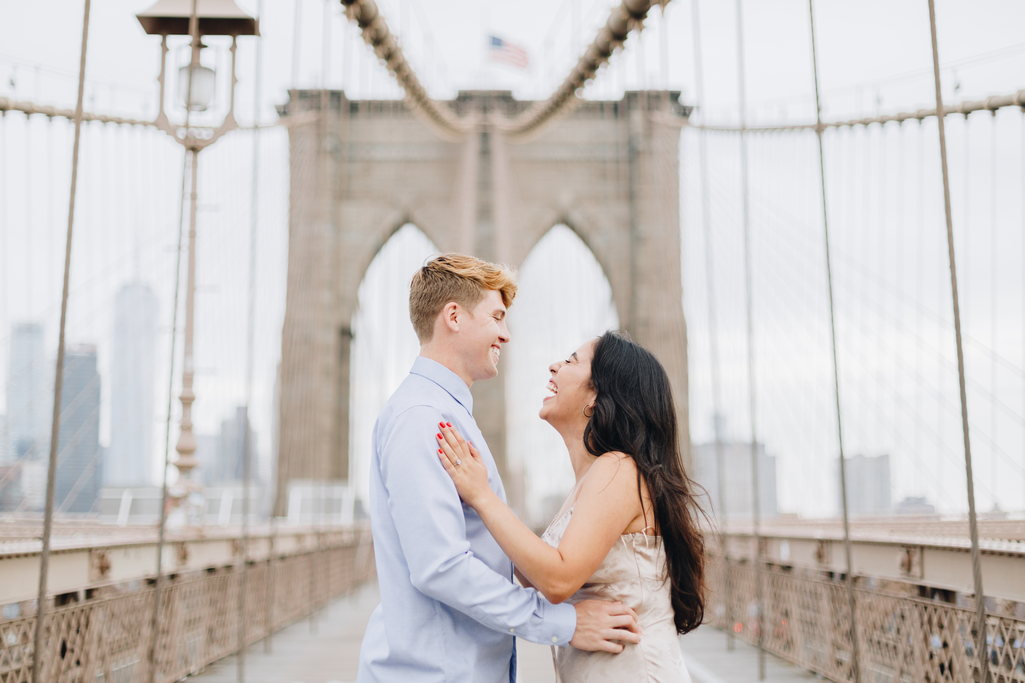 Flirty Summertime Brooklyn Bridge Engagement Photos
