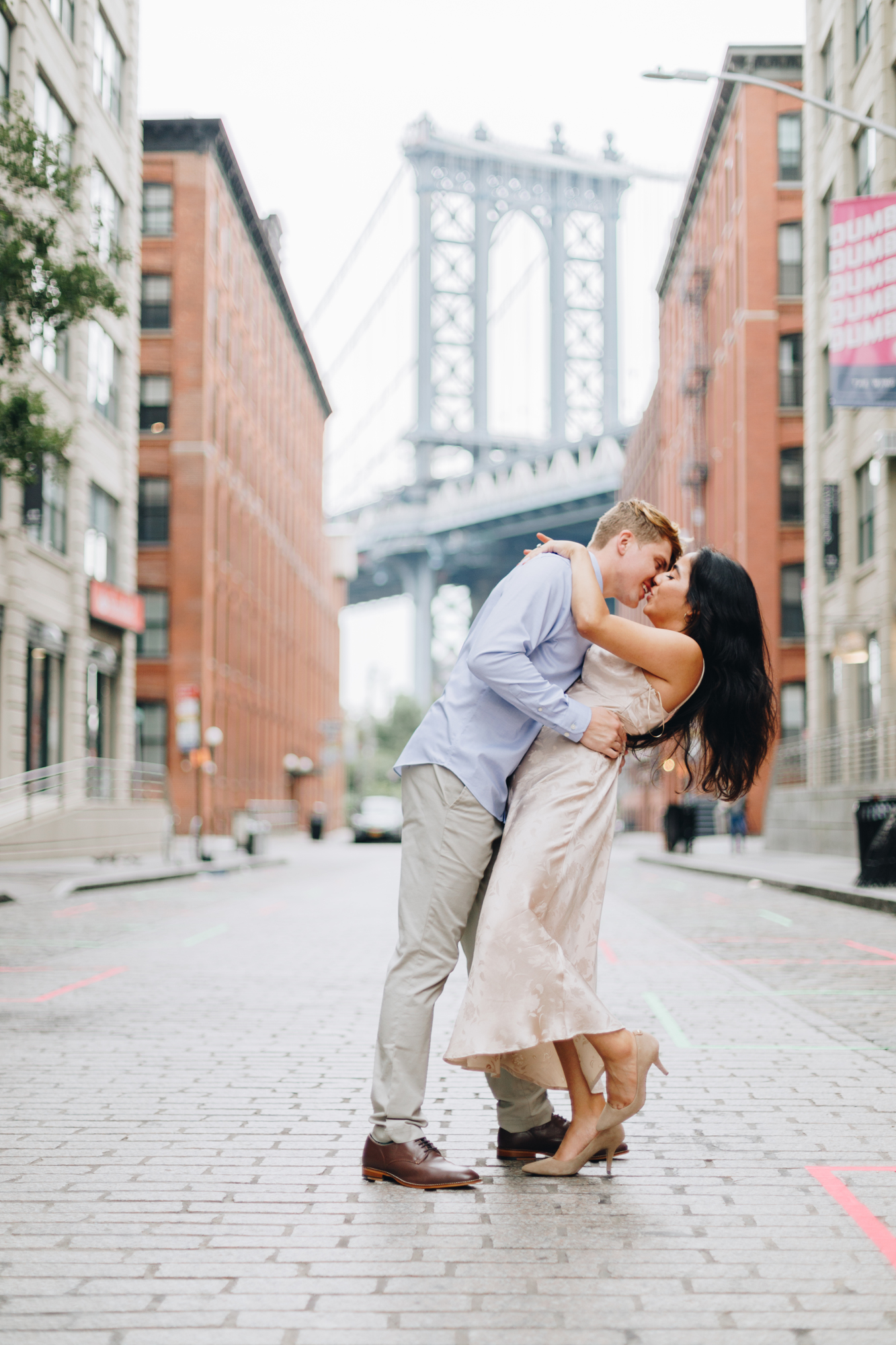 Dazzling Summertime Brooklyn Bridge Engagement Photos