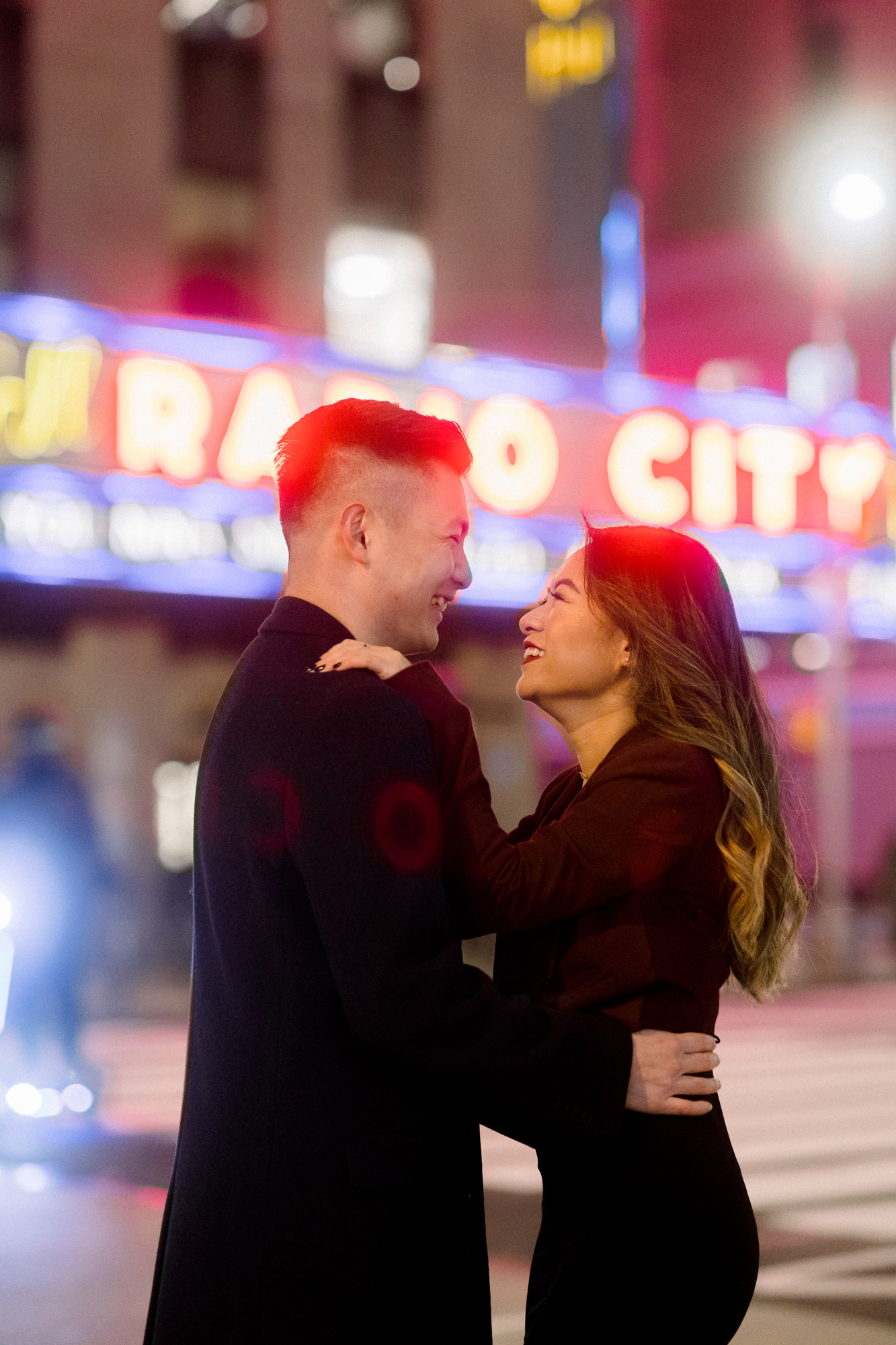 Whimsical Iconic Winter Times Square Engagement Shoot  at Night