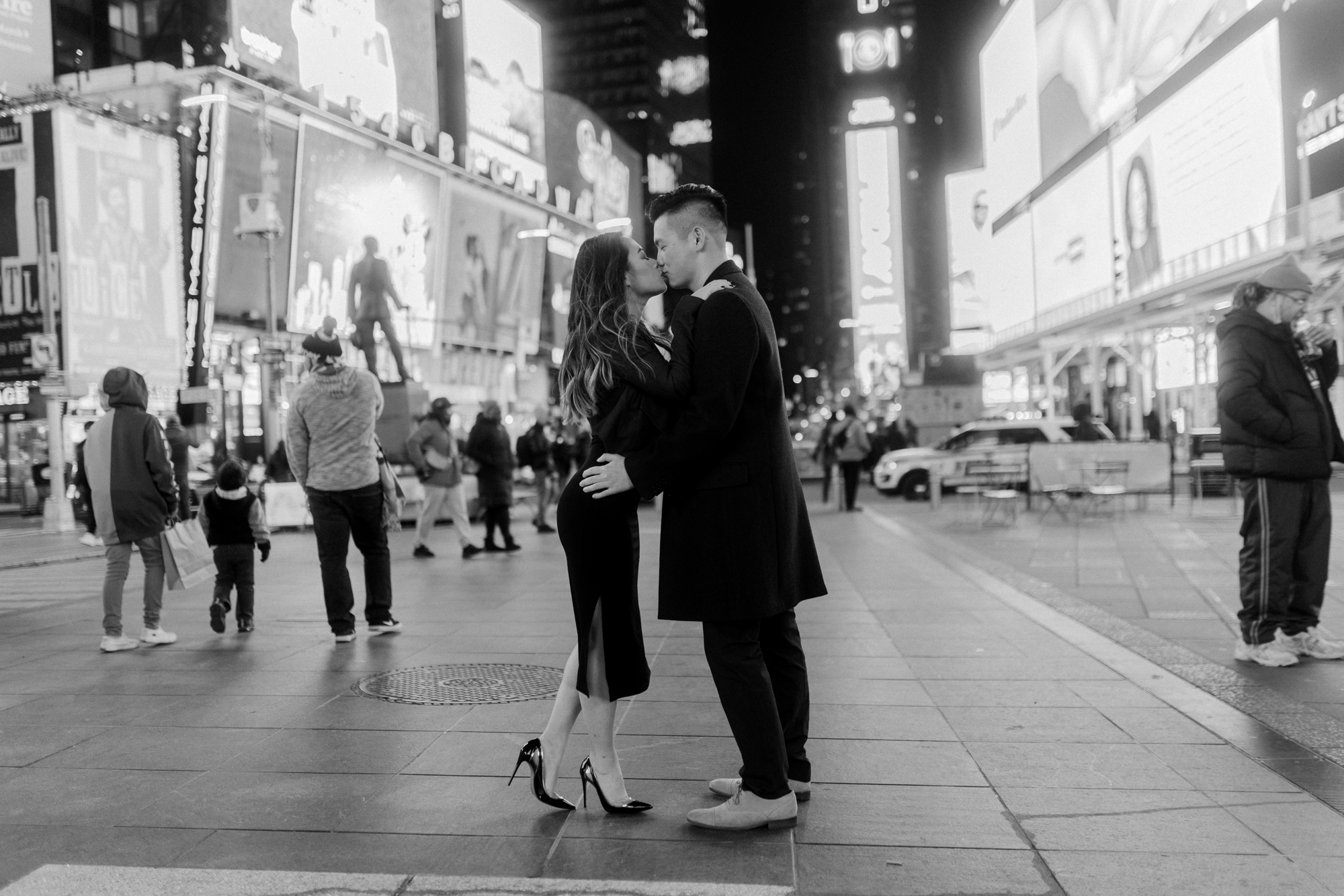 Picturesque Nighttime Winter Engagement Photos in New York's Iconic Times Square
