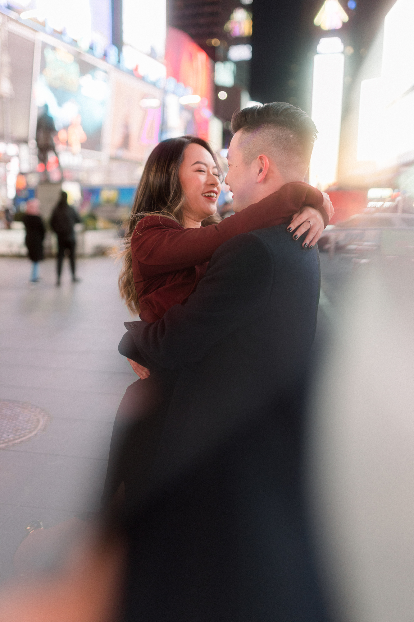 Happy Nighttime Winter Engagement Photos in New York's Iconic Times Square