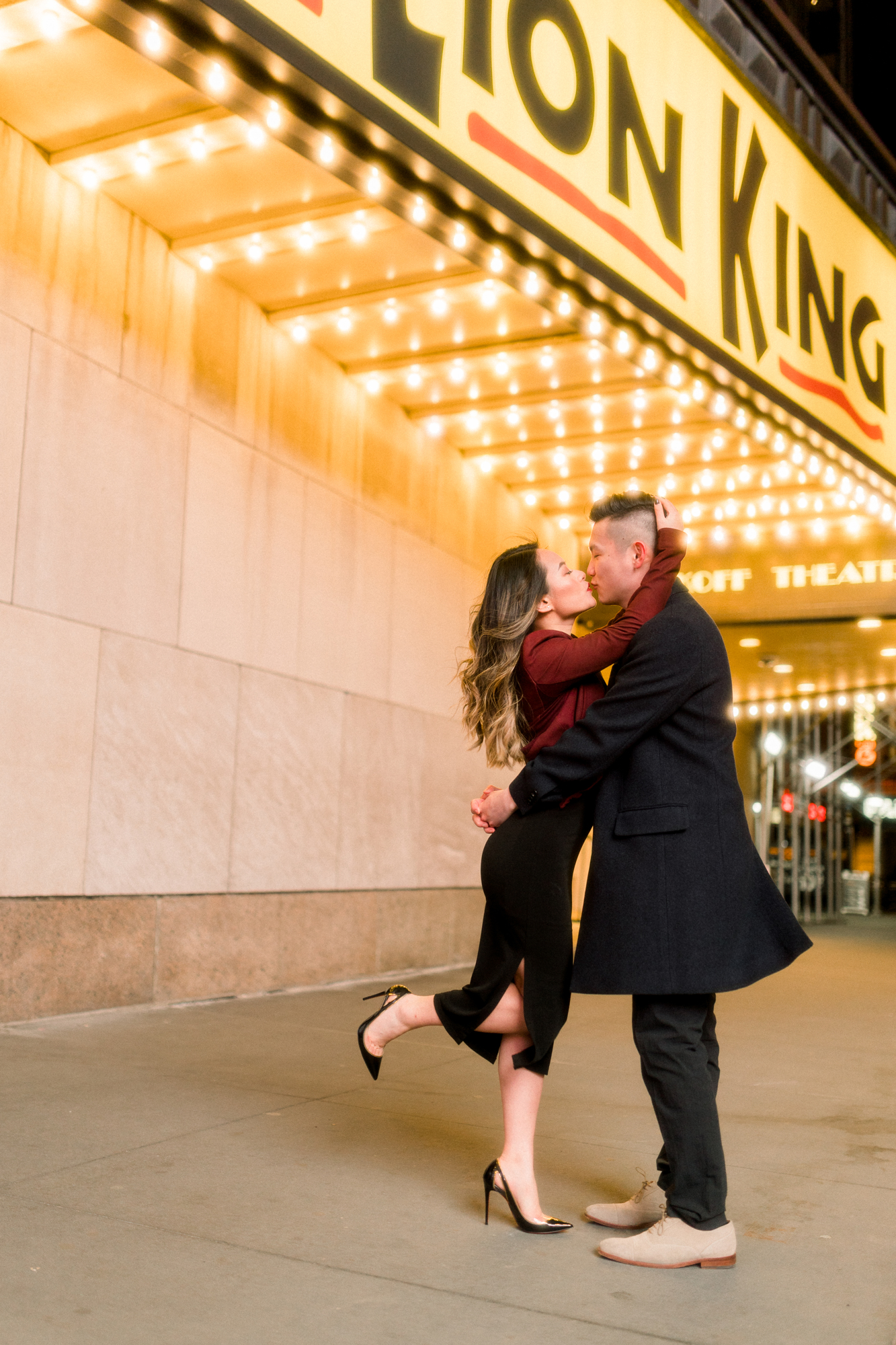 Stylish Nighttime Winter Engagement Photos in New York's Iconic Times Square