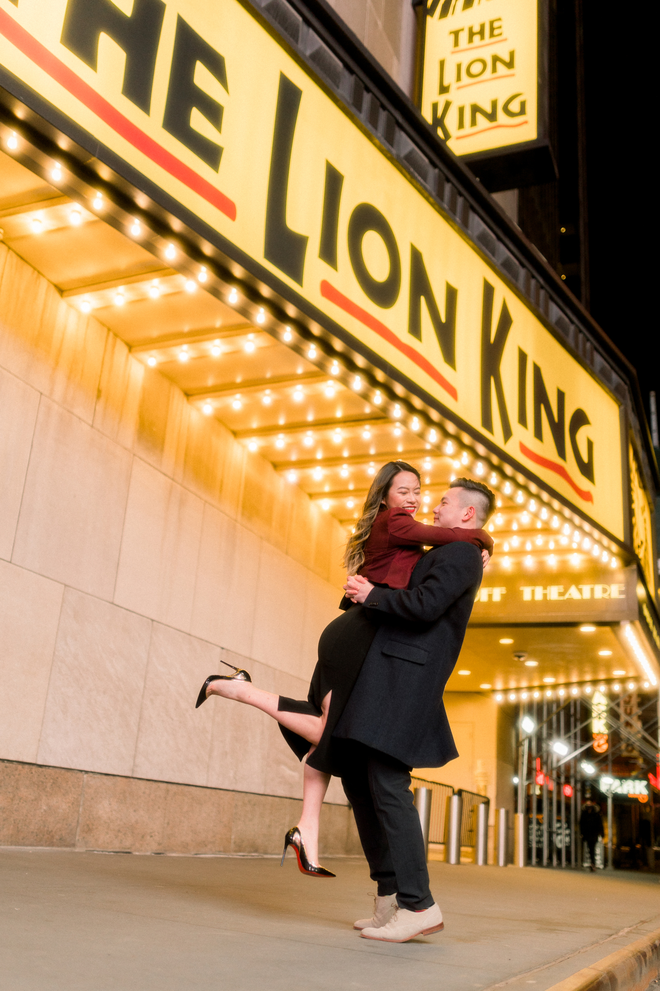 Classic Nighttime Winter Engagement Photos in New York's Iconic Times Square