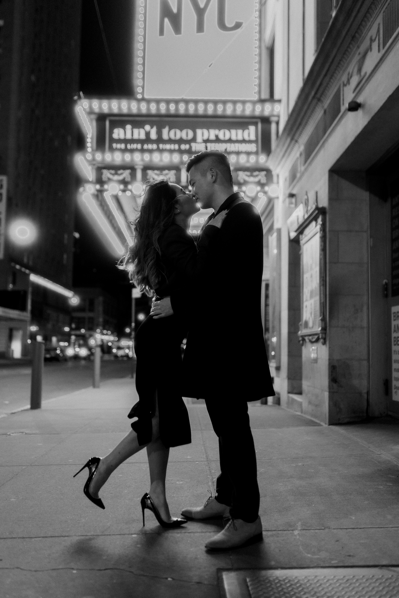 Whimsical Nighttime Winter Engagement Photos in New York's Iconic Times Square