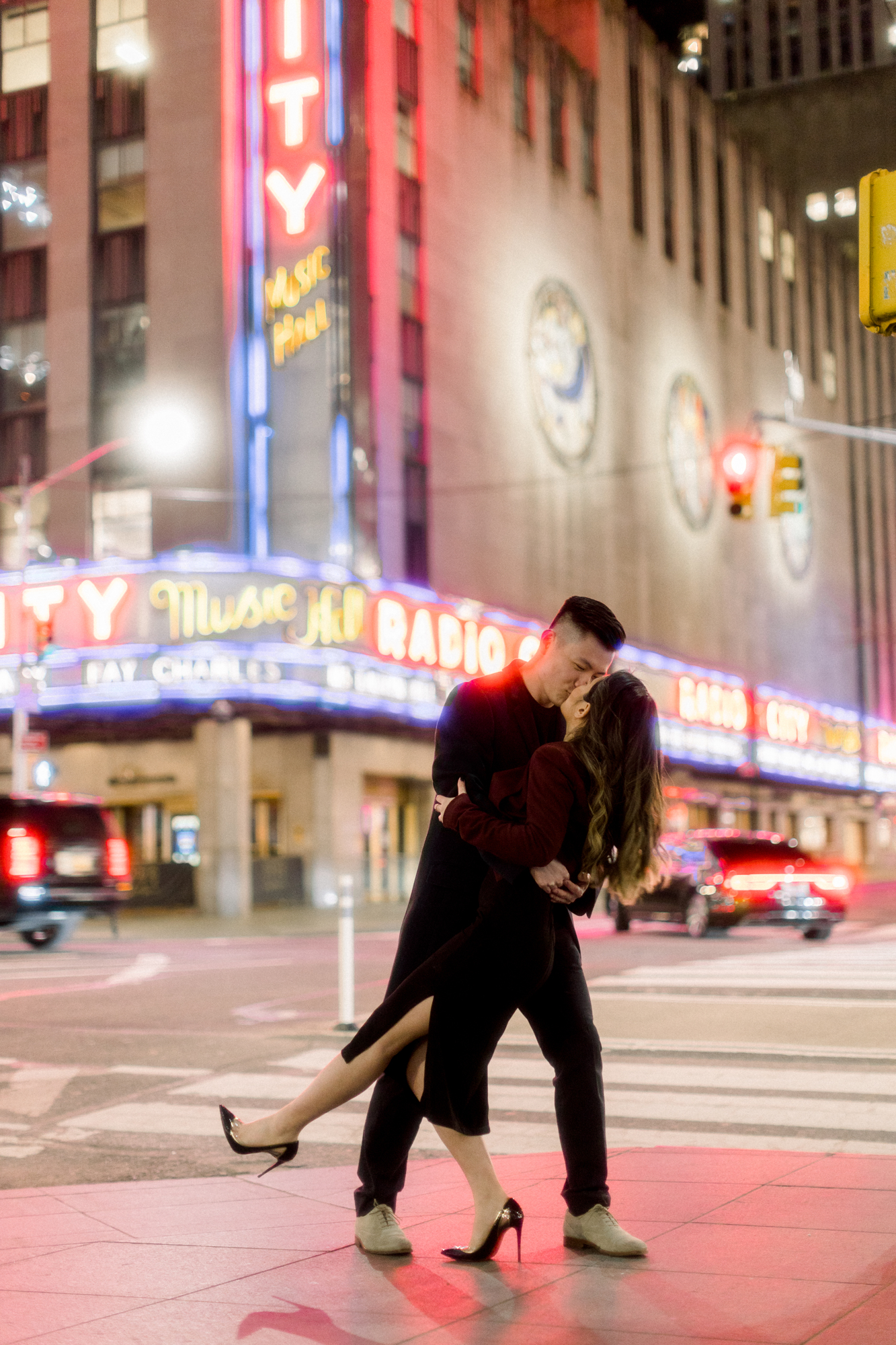 Playful Iconic Winter Times Square Engagement Shoot  at Night