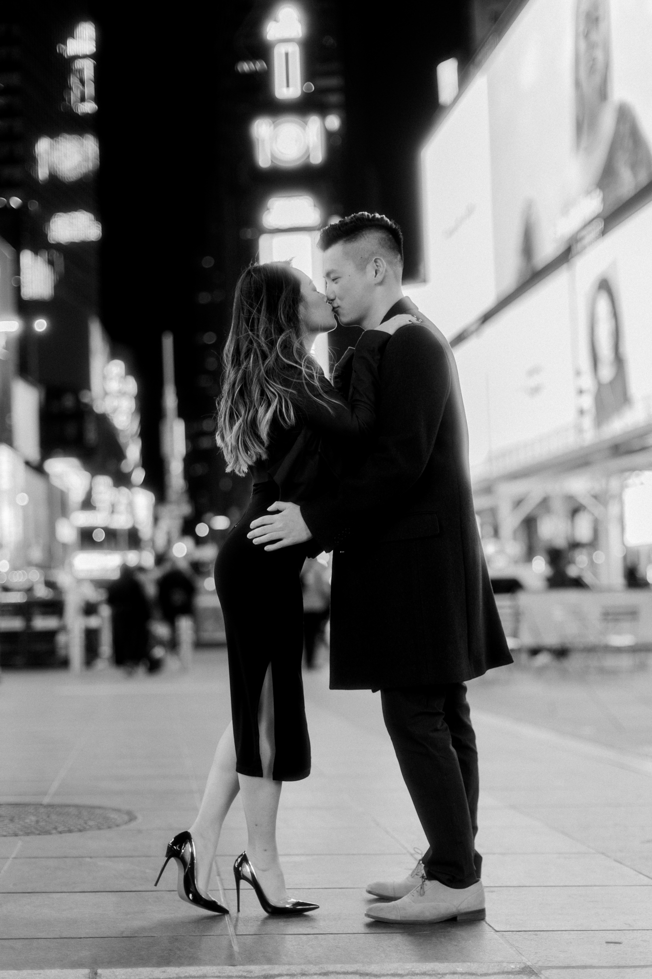 Elegant Nighttime Winter Engagement Photos in New York's Iconic Times Square