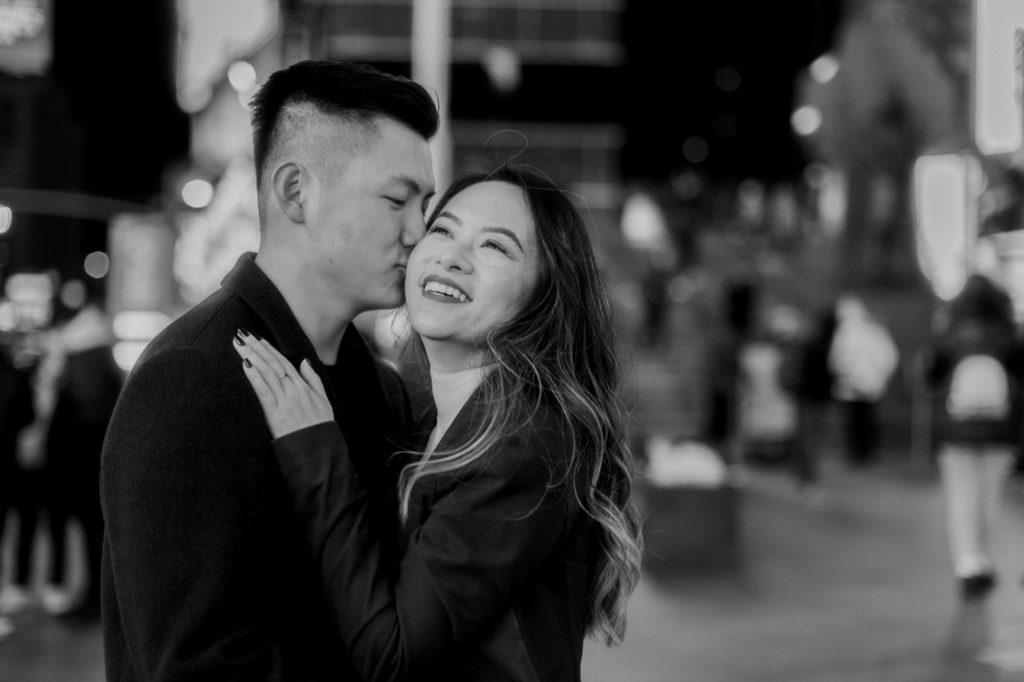 Iconic Winter Times Square Engagement Photos at Night in New York City