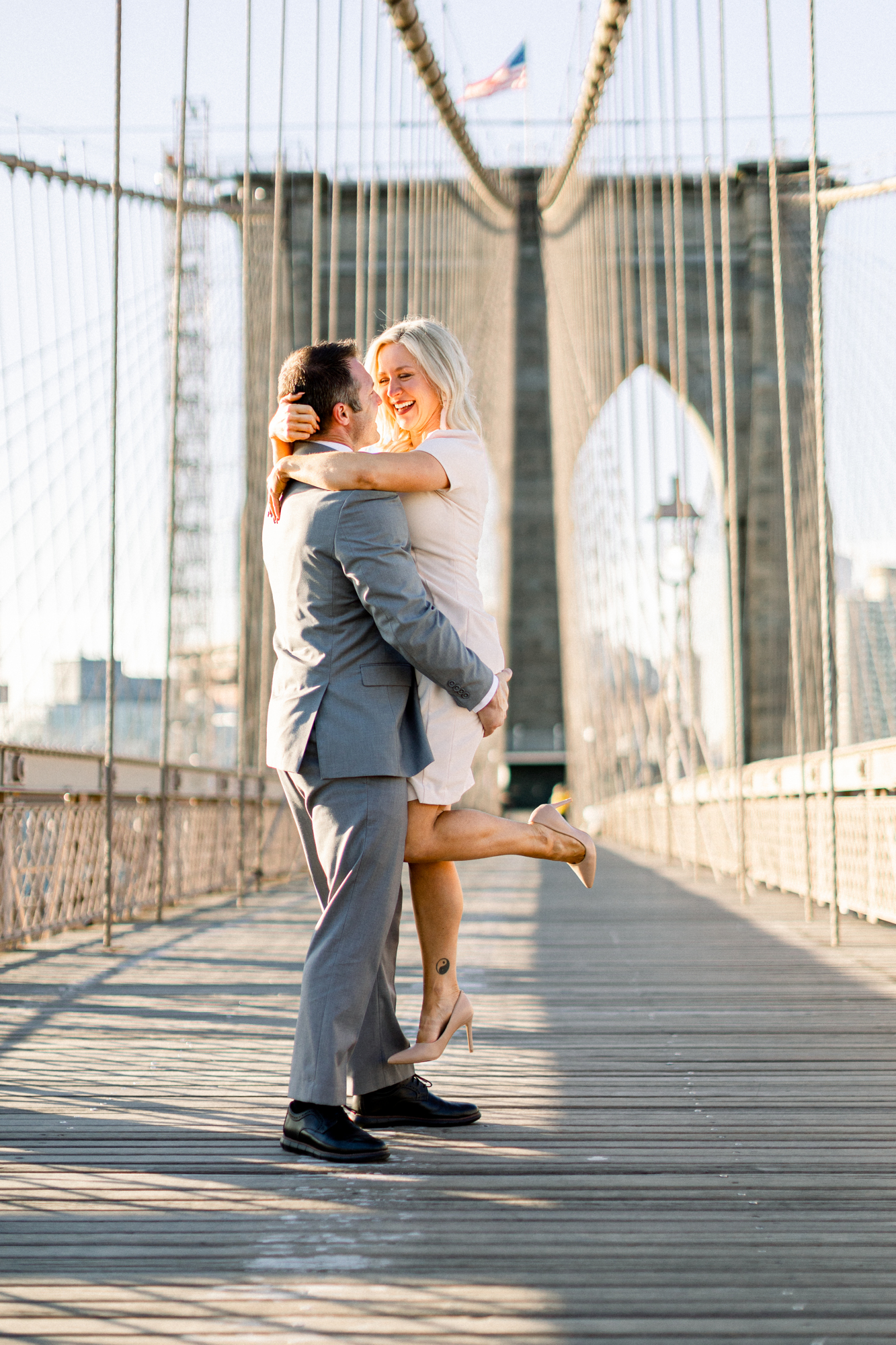 Candid New York Engagement Photos on the Brooklyn Bridge