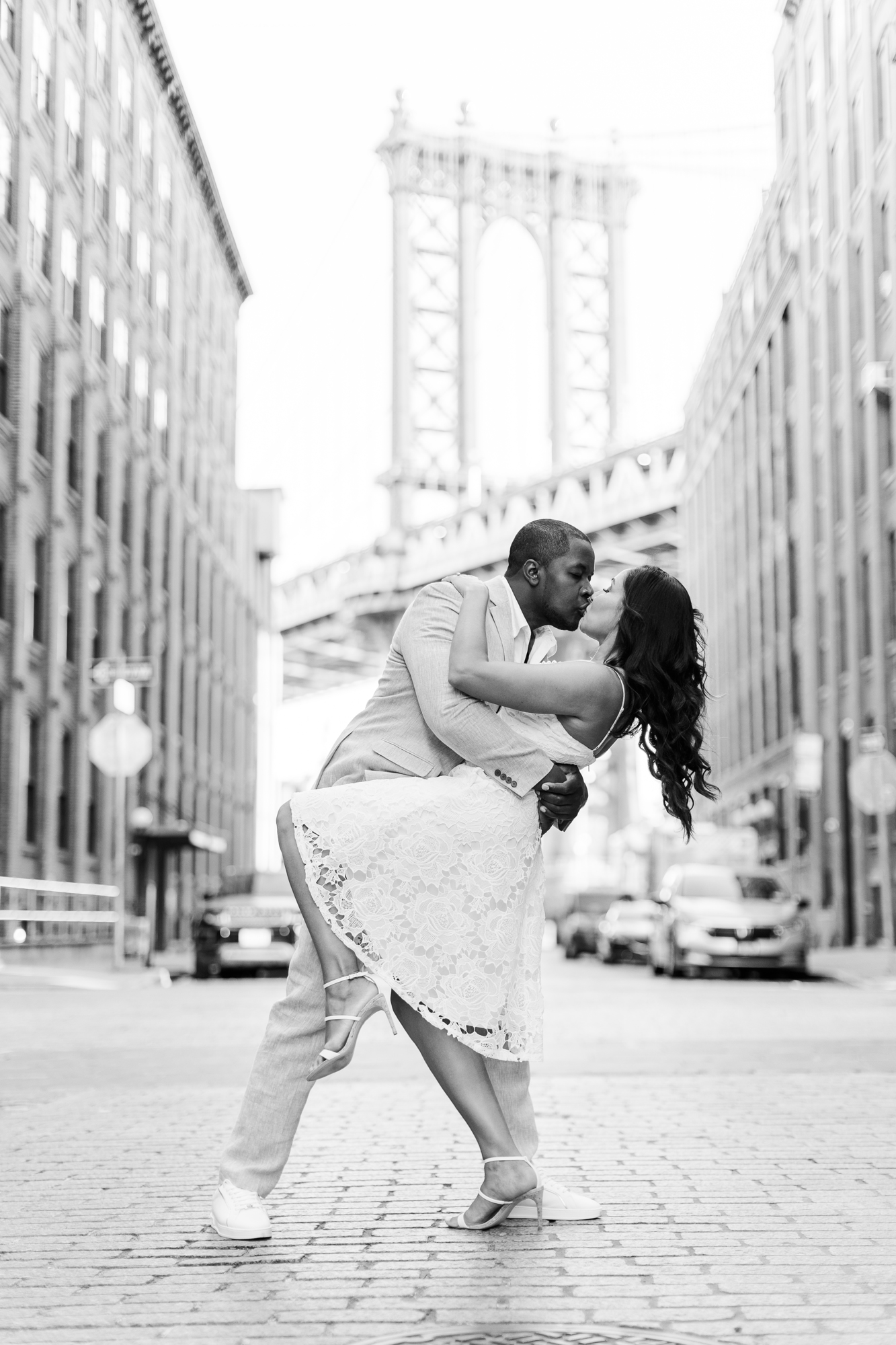 Joyous Engagement Photos on the Brooklyn Bridge